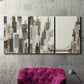 Three-panel canvas wall art featuring abstract harbor inspired composition, displayed in a living room above a suede accent chair.