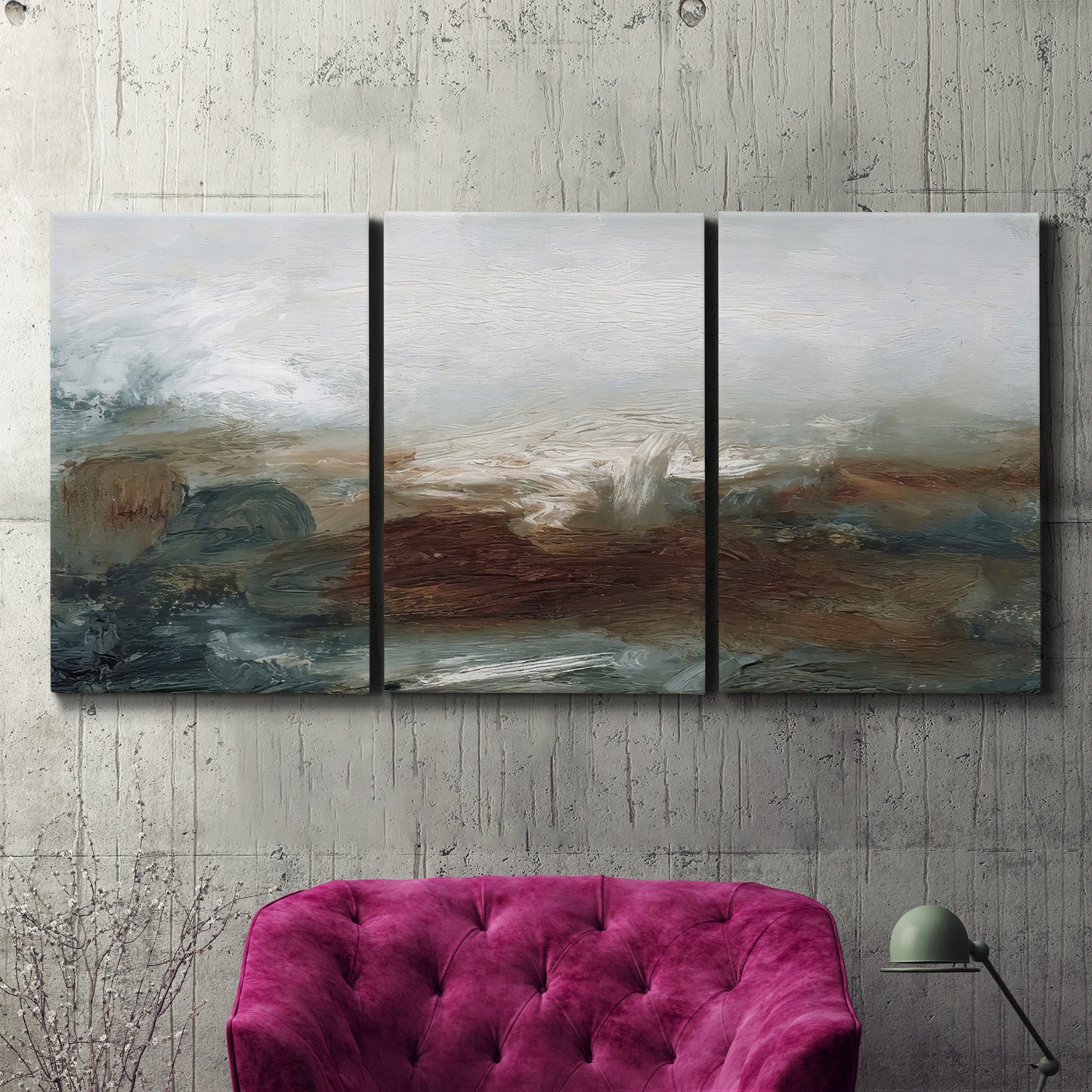 Three-panel canvas wall art featuring soft abstract evening light, displayed in a living room above a suede accent chair.