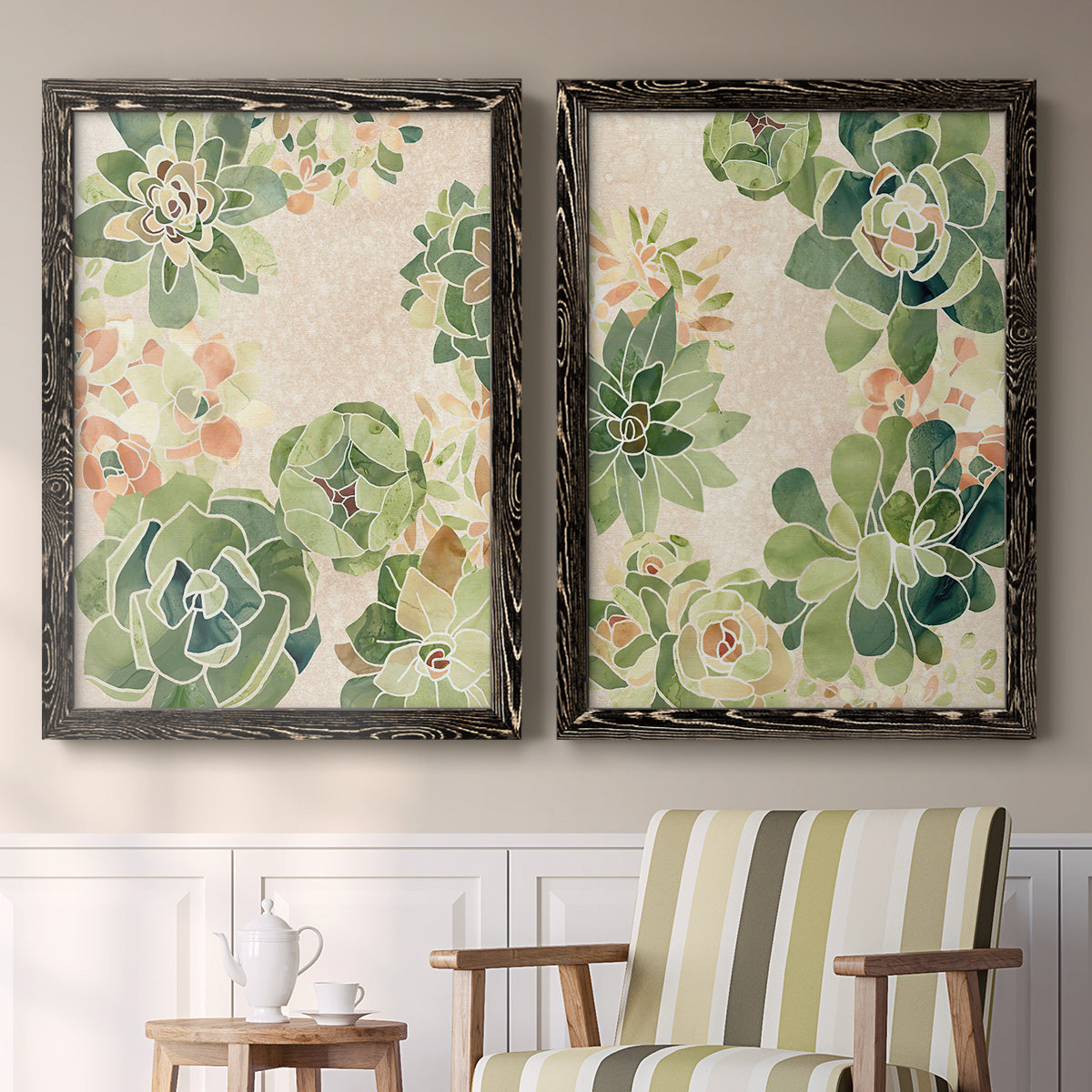 Set of two black barnwood framed canvas prints depicting two decorative botanical pattern prints featuring dense repeating succulents and small flowers above a sideboard in a cozy sitting room.