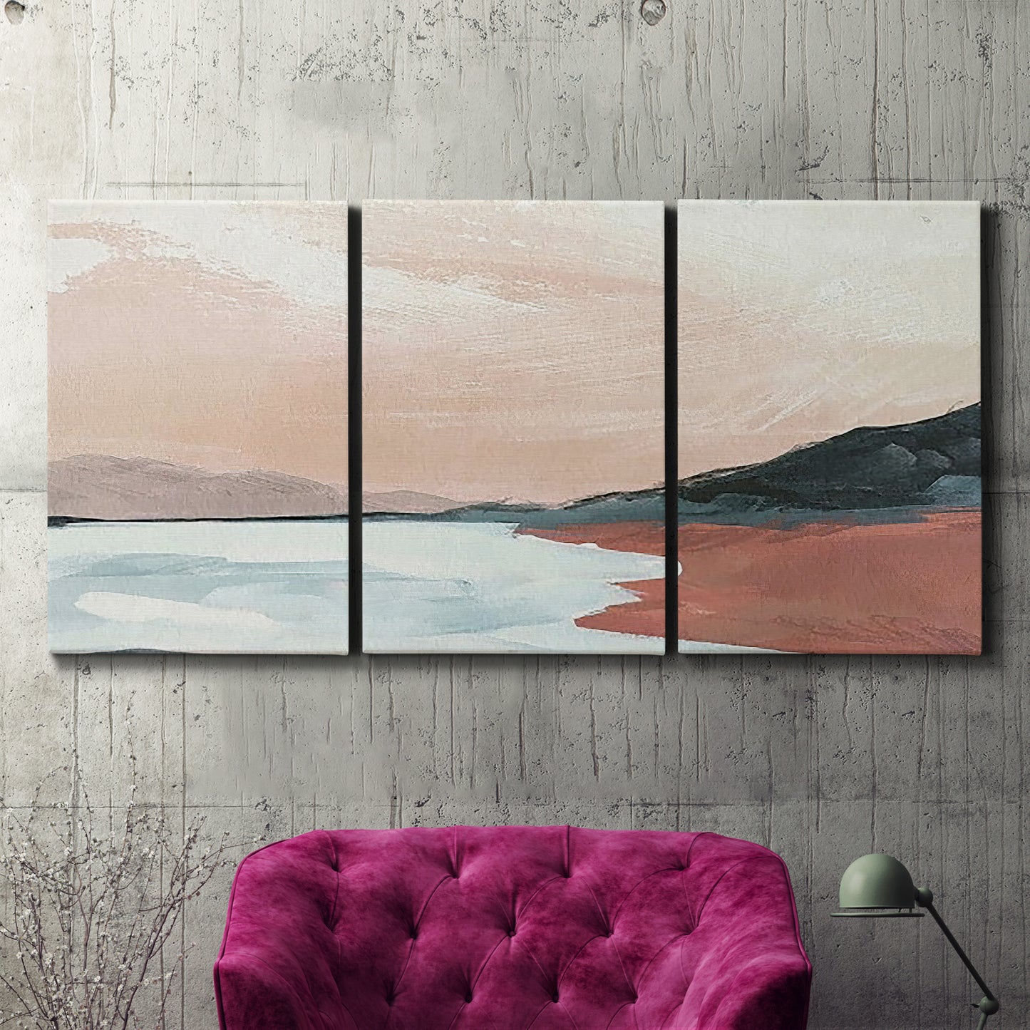 Three-panel canvas wall art featuring quiet coastline with distant horizon, displayed in a living room above a suede accent chair.