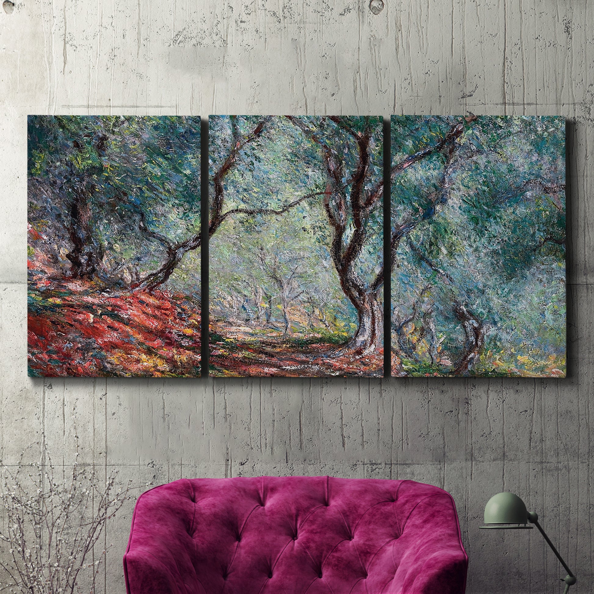 Three-panel canvas wall art featuring olive trees in sunlit garden, displayed in a living room above a suede accent chair.