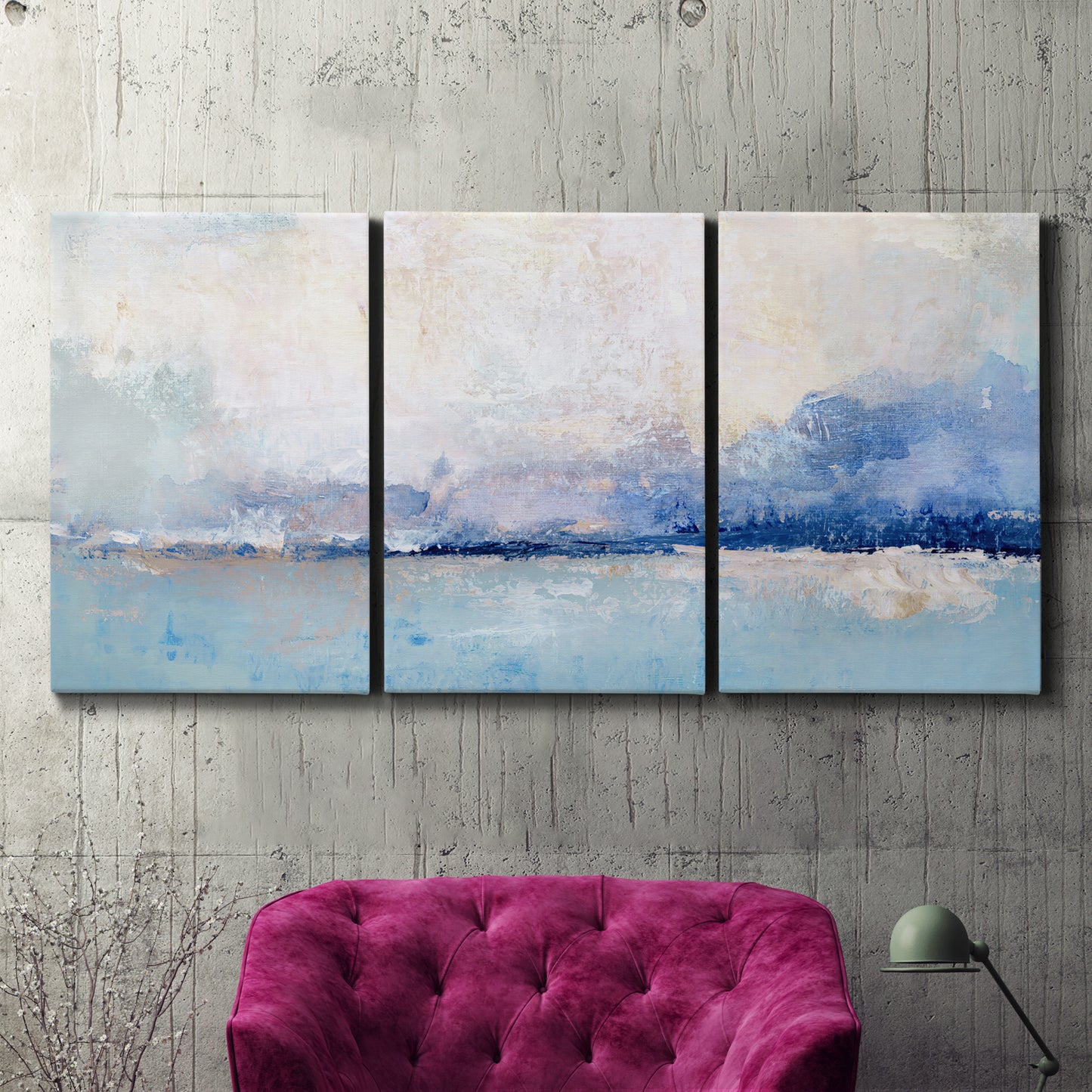 Three-panel canvas wall art featuring abstract bay with rhythmic forms, displayed in a living room above a suede accent chair.