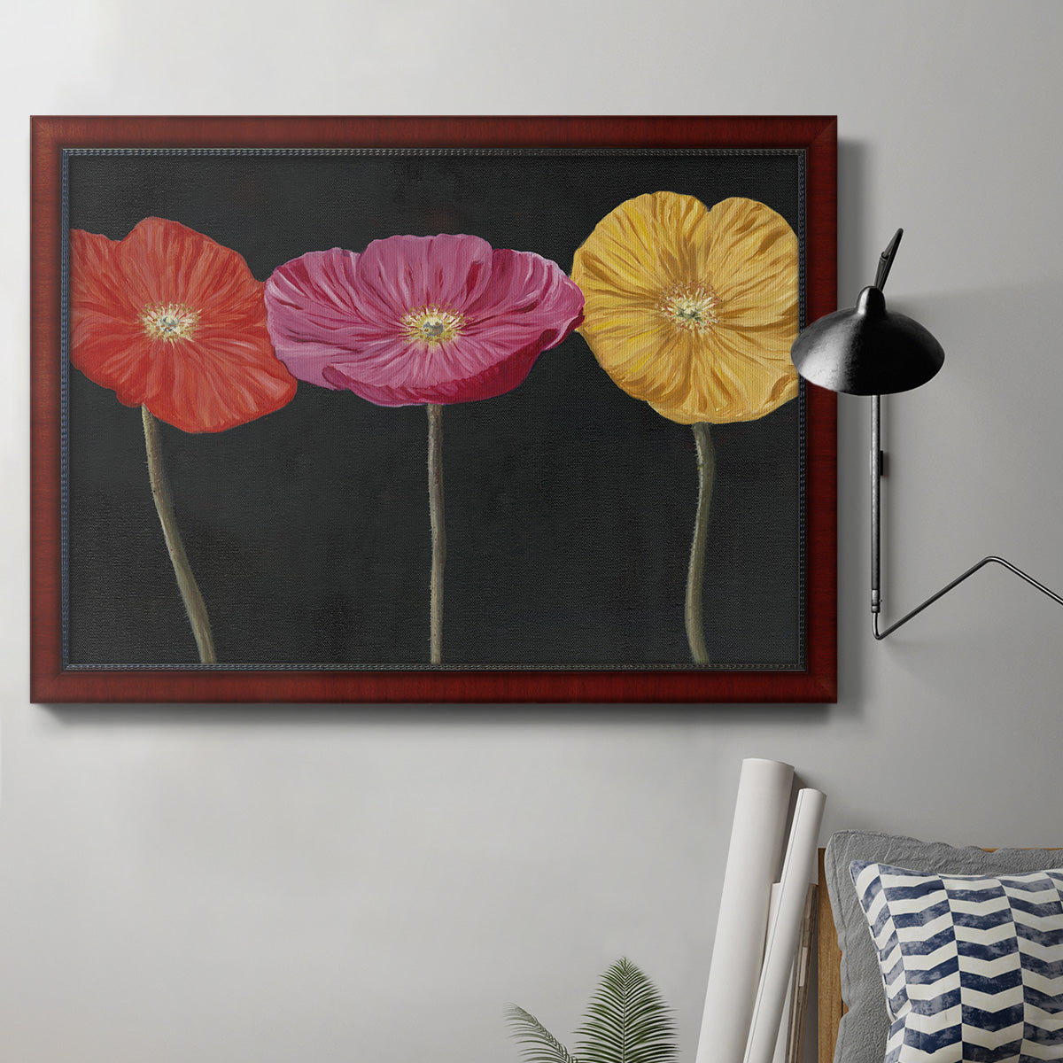 Contemporary poppy flower artwork in an ornate cherry burl wood frame displayed in a neutral interior setting.