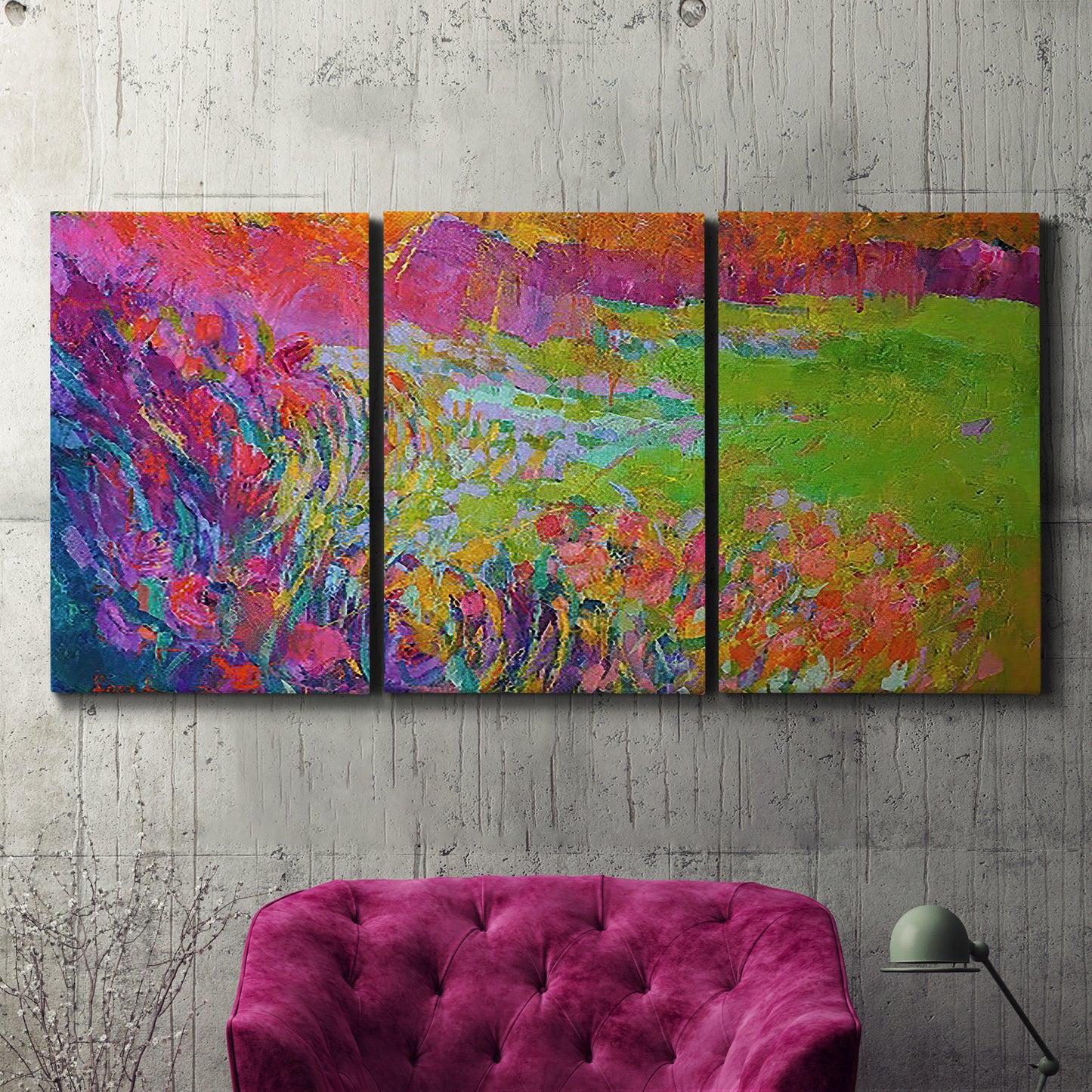 Three-panel canvas wall art featuring abstract meadow inspired color fields, displayed in a living room above a suede accent chair.