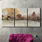 Three-panel canvas wall art featuring autumn landscape with trees and field, displayed in a living room above a suede accent chair.