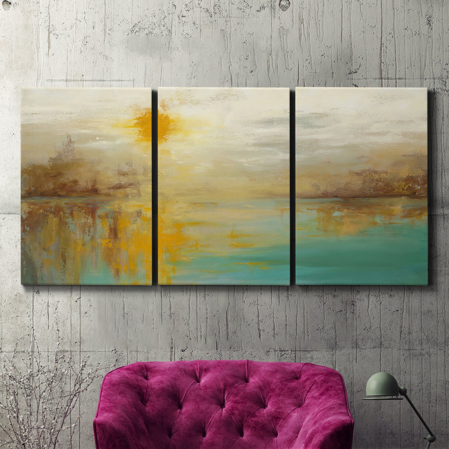 Three-panel canvas wall art featuring warm abstract end of summer palette, displayed in a living room above a suede accent chair.