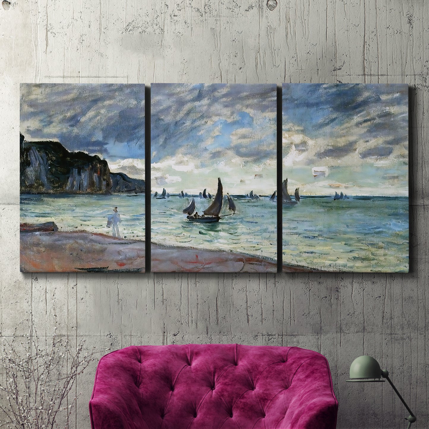 Three-panel canvas wall art featuring figures walking along sandy shoreline, displayed in a living room above a suede accent chair.