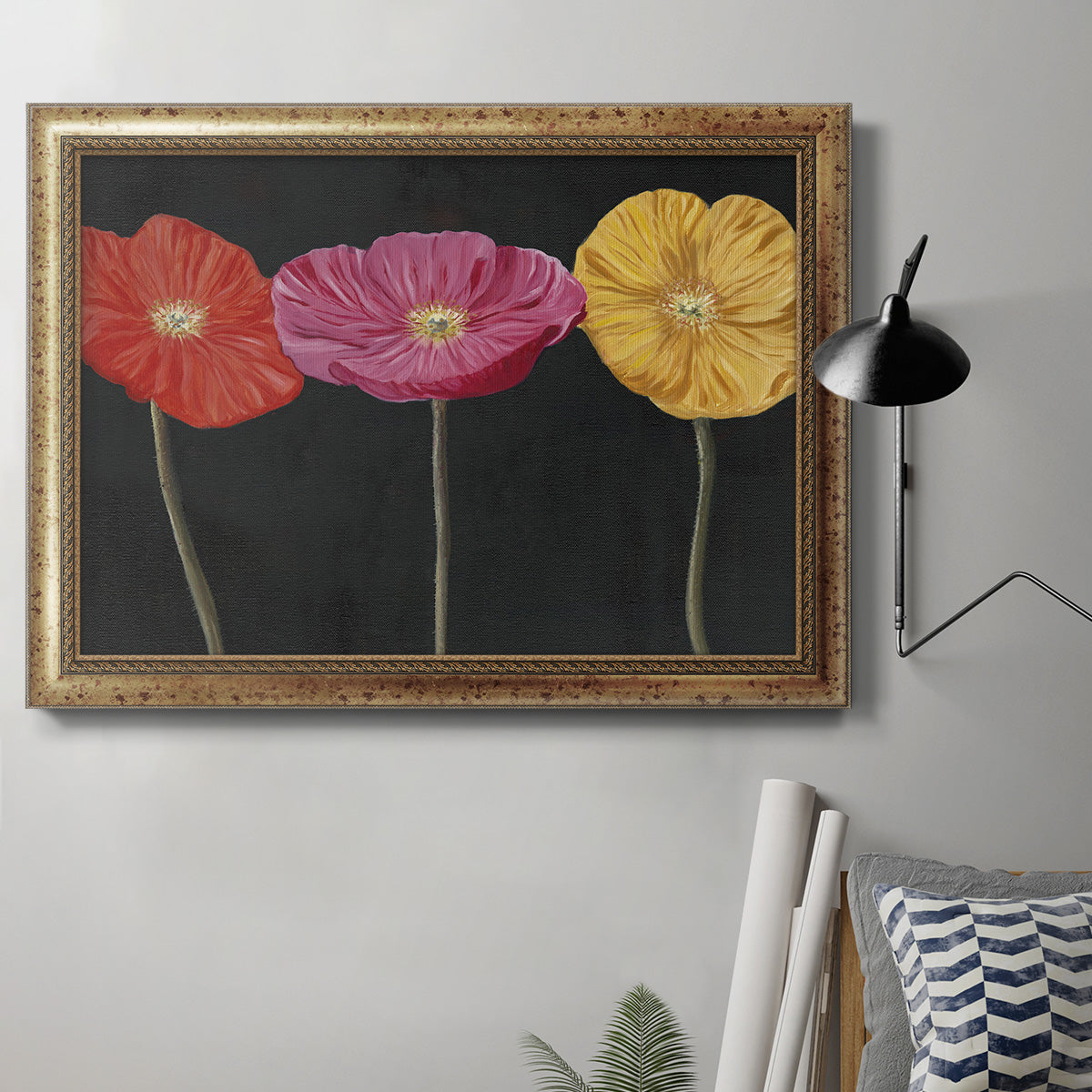 Contemporary poppy flower artwork in an ornate vintage gold frame displayed in a neutral interior setting.