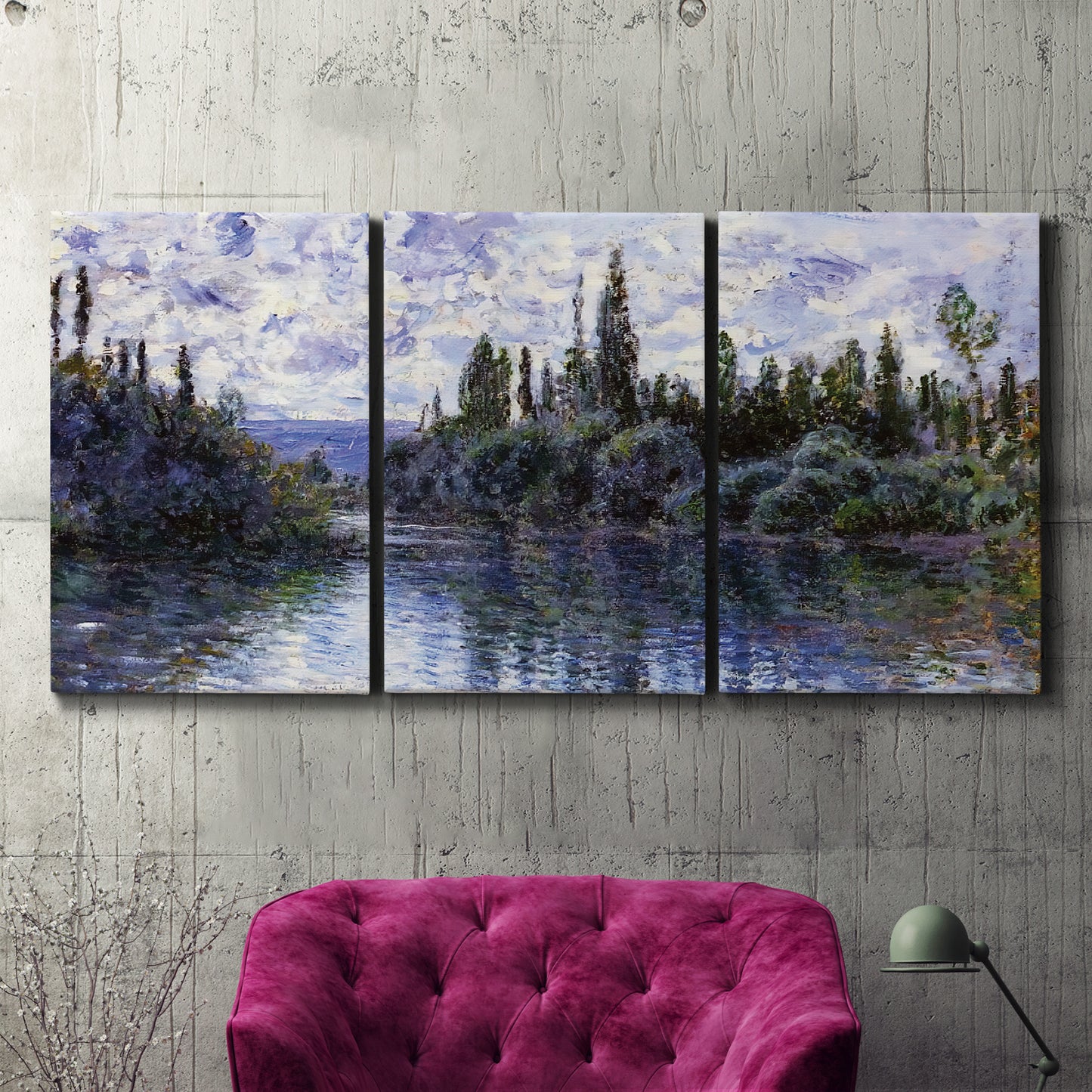 Three-panel canvas wall art featuring quiet river bend near village, displayed in a living room above a suede accent chair.