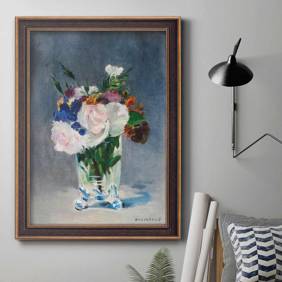 Impressionist floral still life painting by Claude Monet in an ornate bronzed mahogany wood frame displayed in a neutral interior setting.