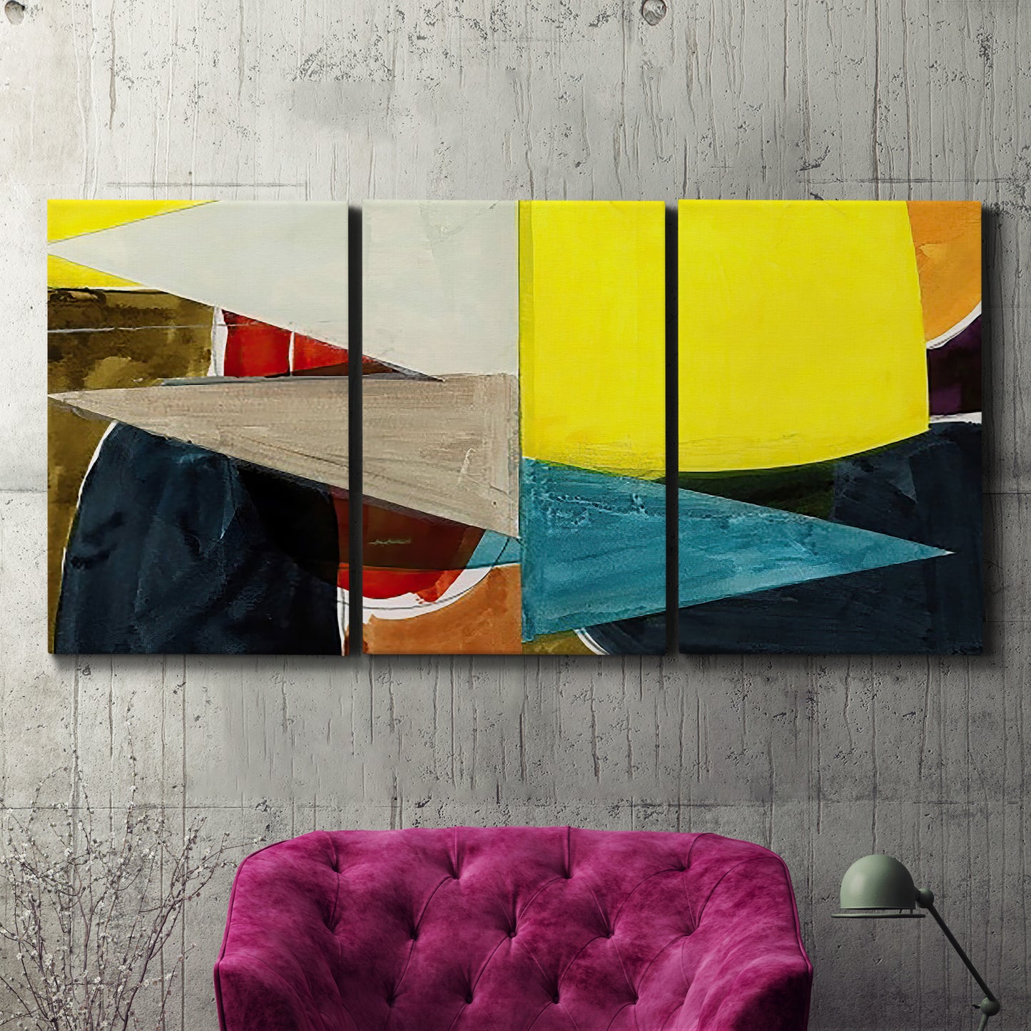 Three-panel canvas wall art featuring geometric mid century abstract blocks, displayed in a living room above a suede accent chair.