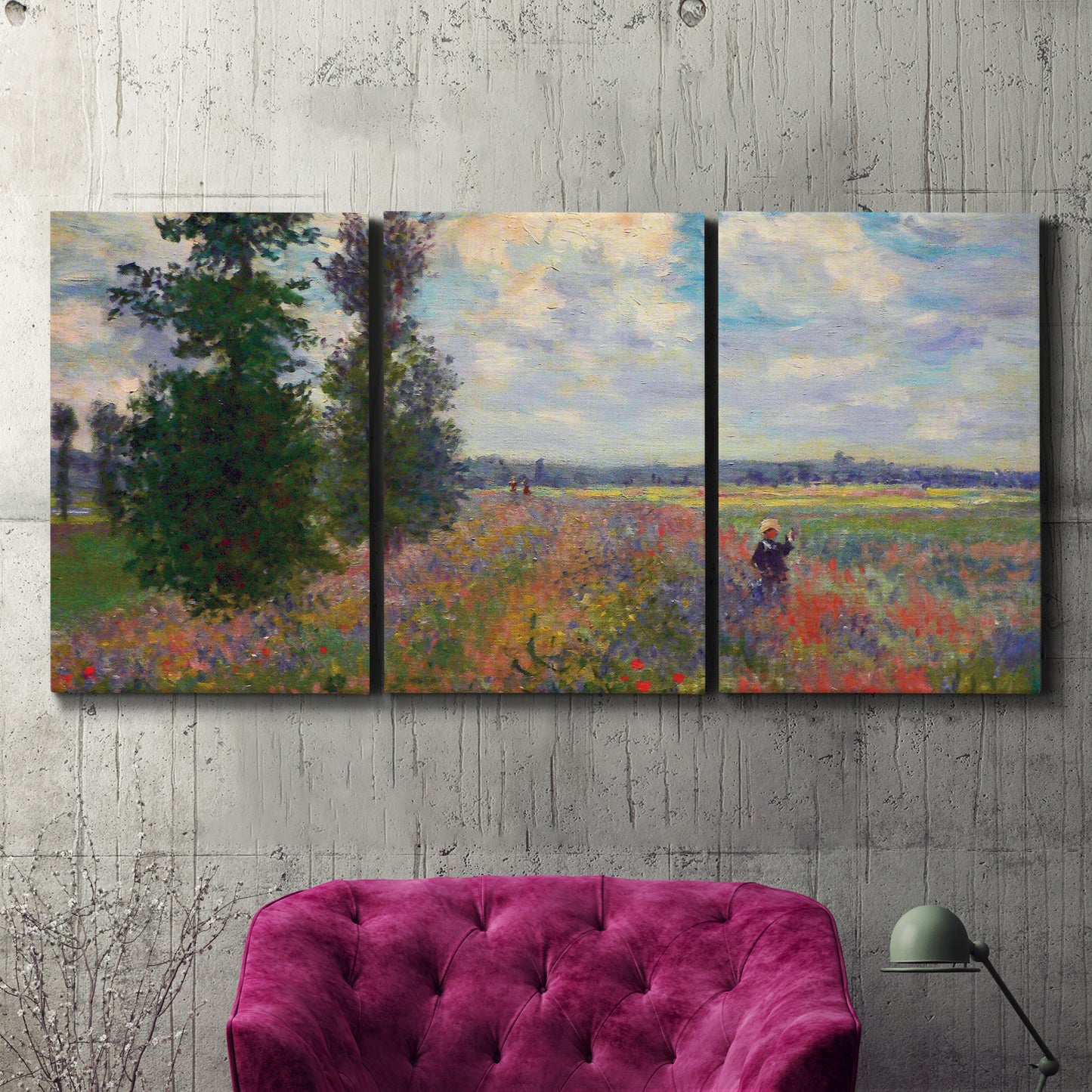 Three-panel canvas wall art featuring poppy field in open countryside, displayed in a living room above a suede accent chair.