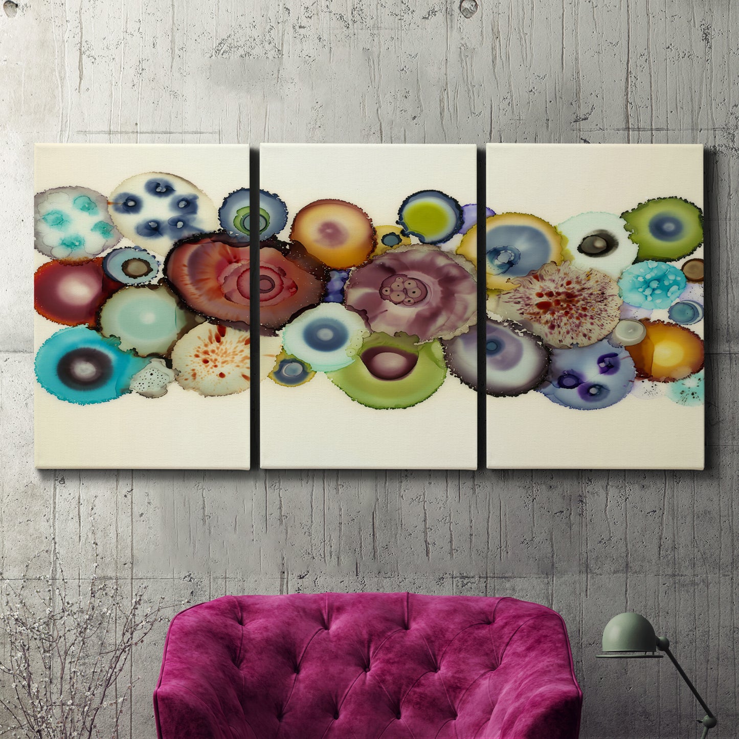 Three-panel canvas wall art featuring mid century geometric red pathway, displayed in a living room above a suede accent chair.