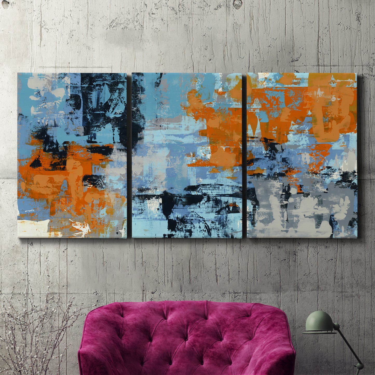 Three-panel canvas wall art featuring mid century abstract playground shapes, displayed in a living room above a suede accent chair.