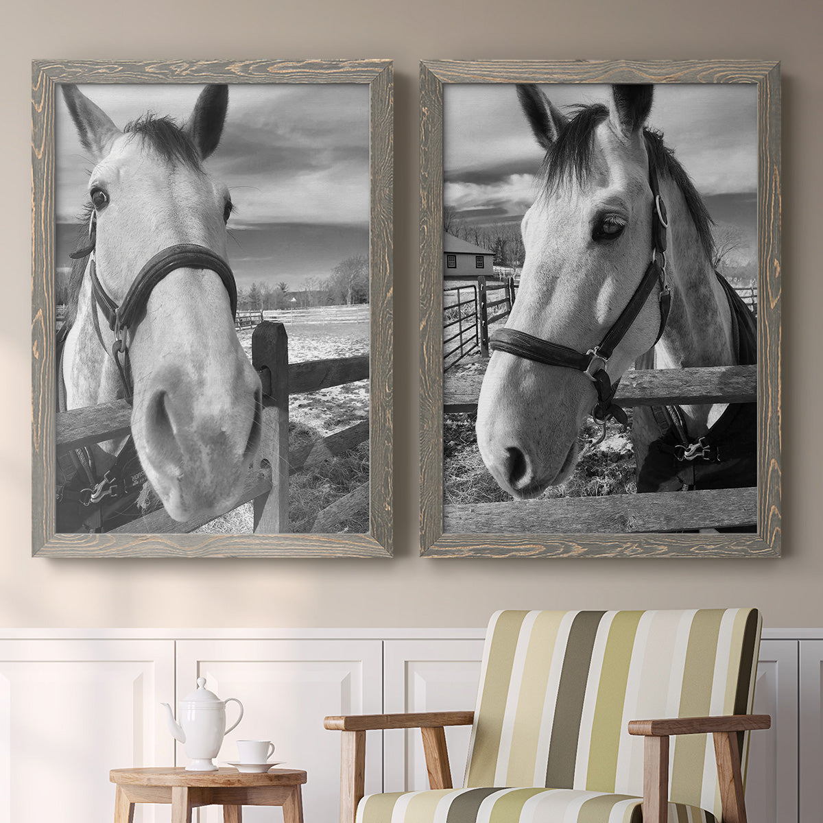 Set of two gray barnwood framed canvas prints depicting two modern equestrian photography featuring black-and-white close-up portraits of horses at fences above a sideboard in a cozy sitting room.