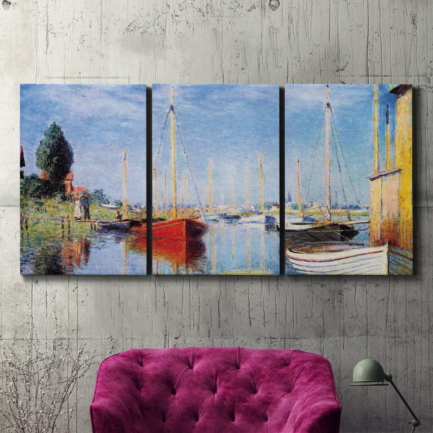 Three-panel canvas wall art featuring sailboats gathered along river, displayed in a living room above a suede accent chair.