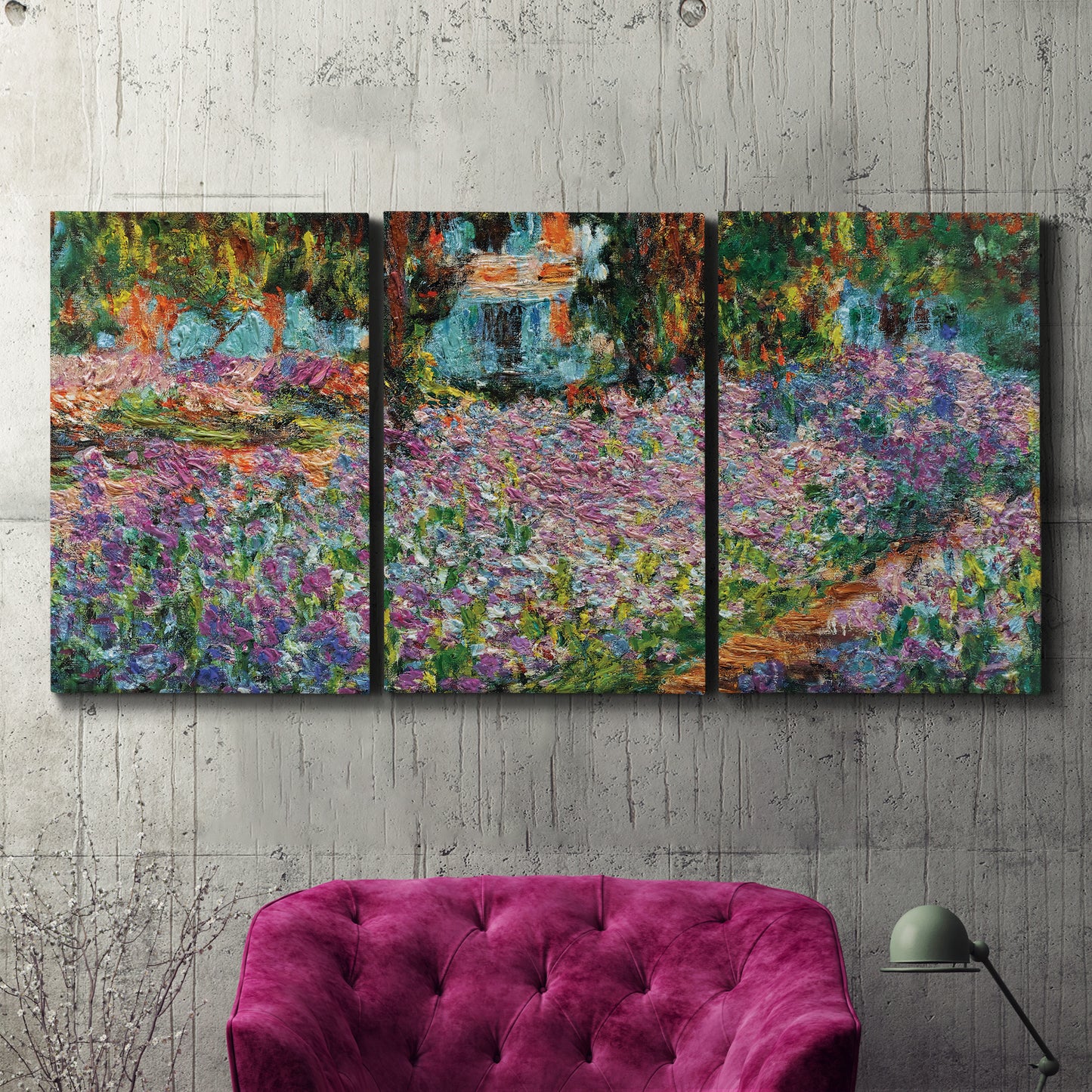 Three-panel canvas wall art featuring blooming irises in garden bed, displayed in a living room above a suede accent chair.
