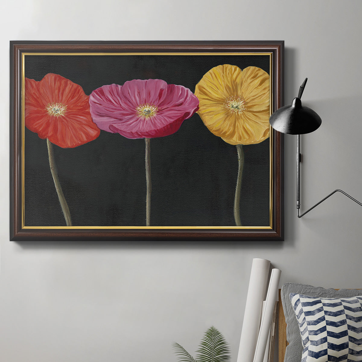 Contemporary poppy flower artwork in an ornate mahogany wood frame with gold liner displayed in a neutral interior setting.