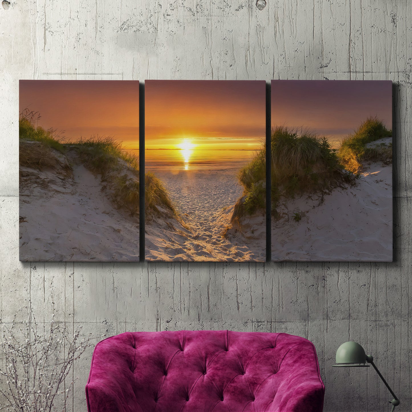 Three-panel canvas wall art featuring sunlit tropical path through greenery, displayed in a living room above a suede accent chair.