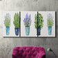 Three-panel canvas wall art featuring minimal monochrome abstract forms, displayed in a living room above a suede accent chair.