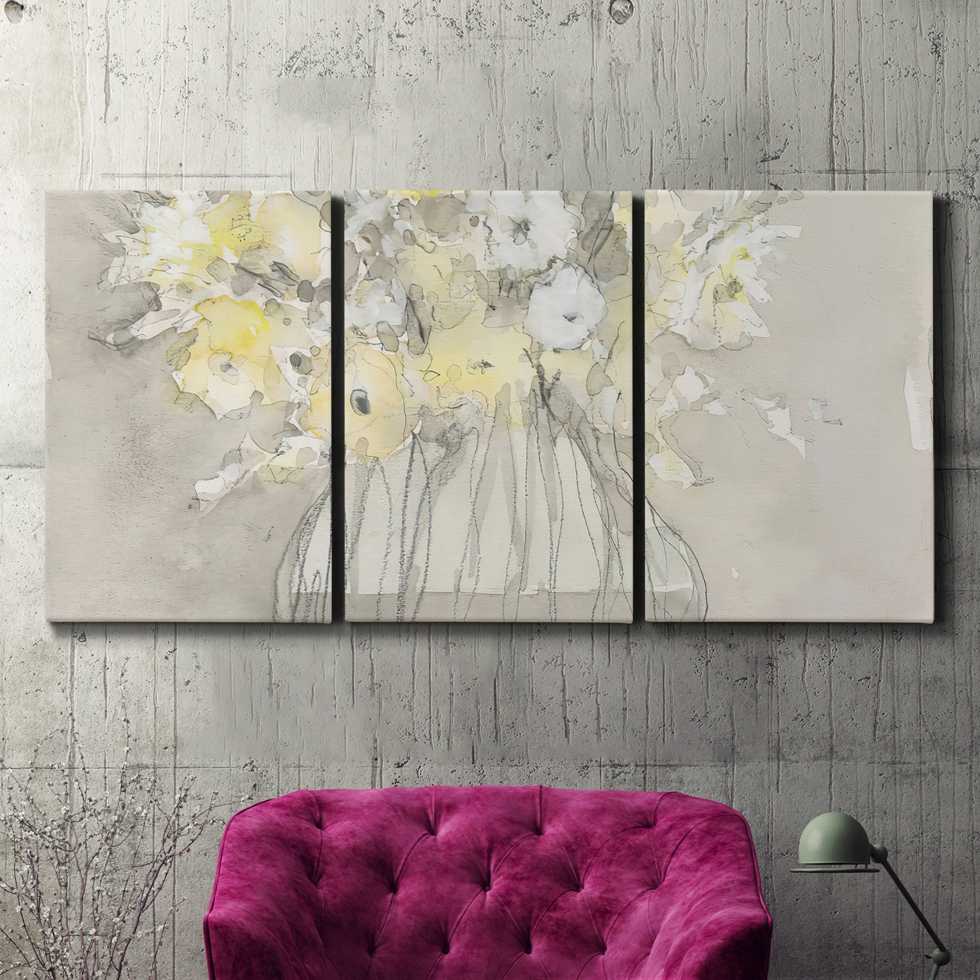 Three-panel canvas wall art featuring vintage floral abstract composition, displayed in a living room above a suede accent chair.