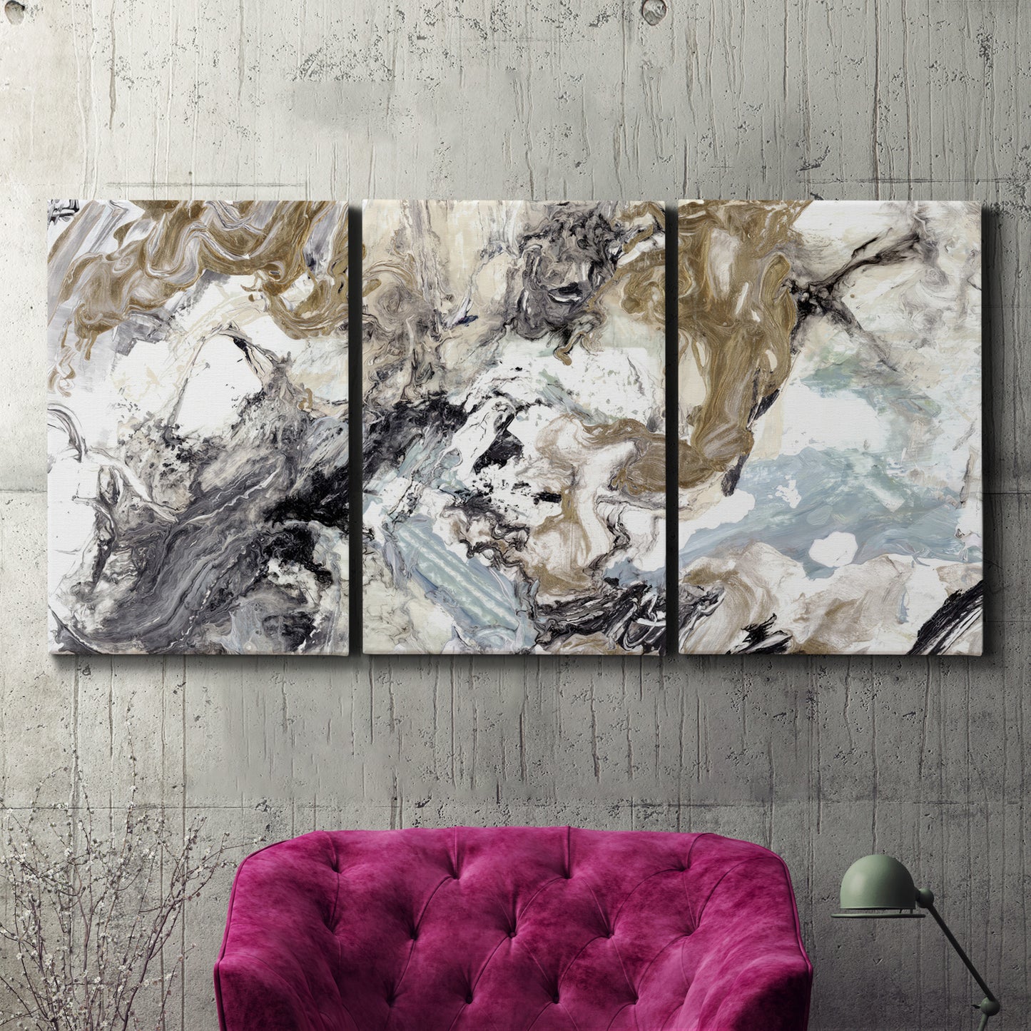 Three-panel canvas wall art featuring marbled modern abstract textures, displayed in a living room above a suede accent chair.