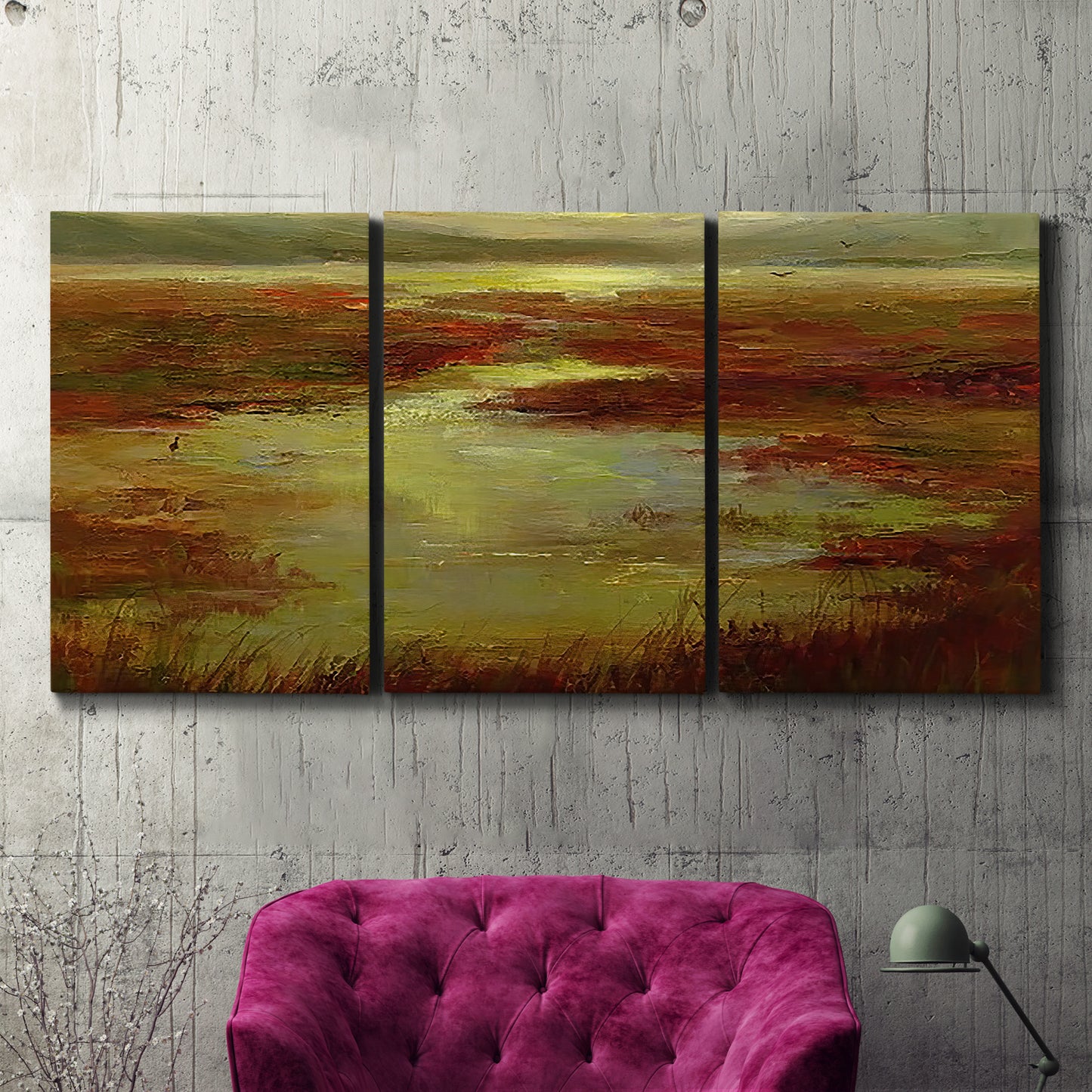 Three-panel canvas wall art featuring coastal shoreline with warm light, displayed in a living room above a suede accent chair.