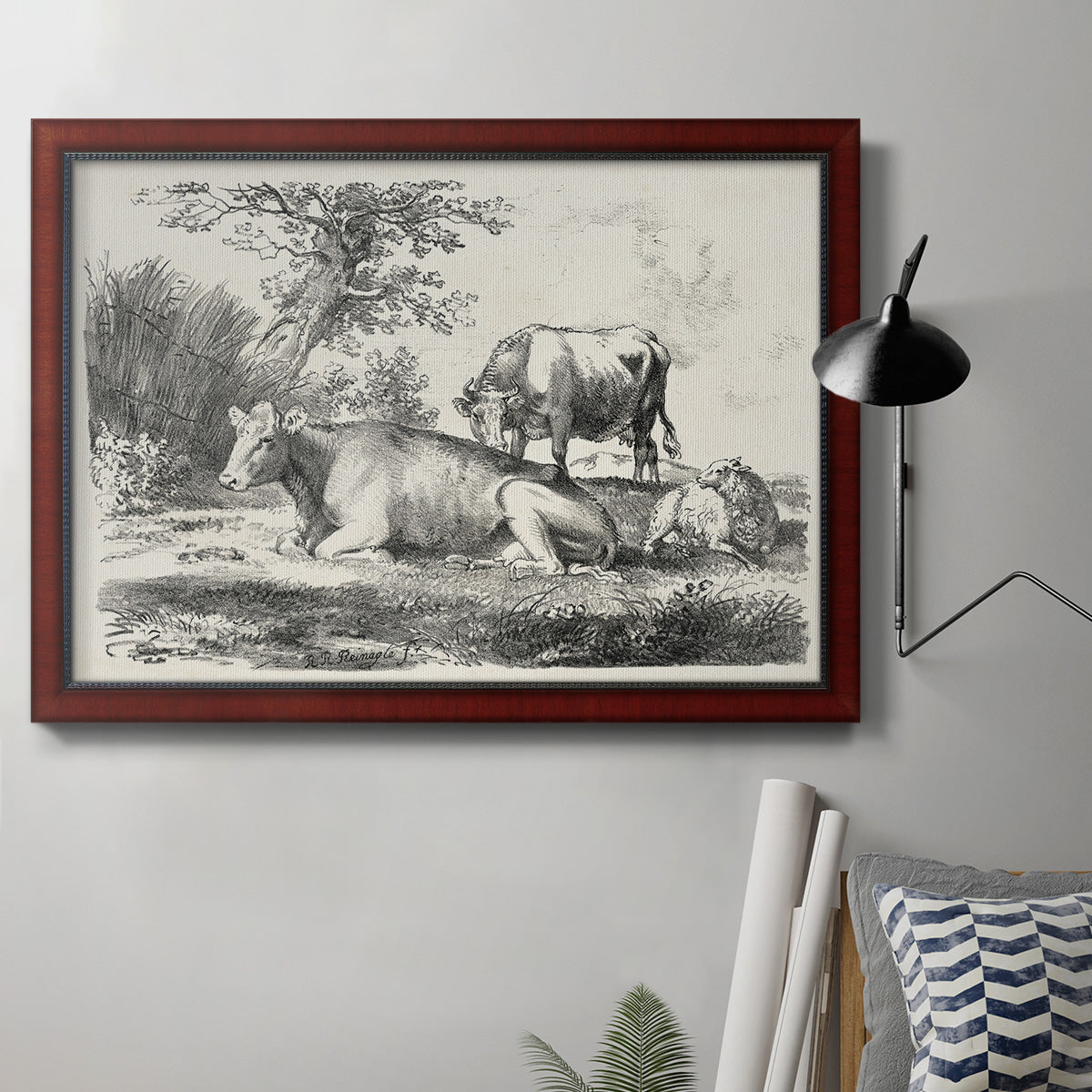 Classical pastoral landscape artwork by Nicolas Berchem in an ornate cherry burl wood frame displayed in a neutral interior setting.