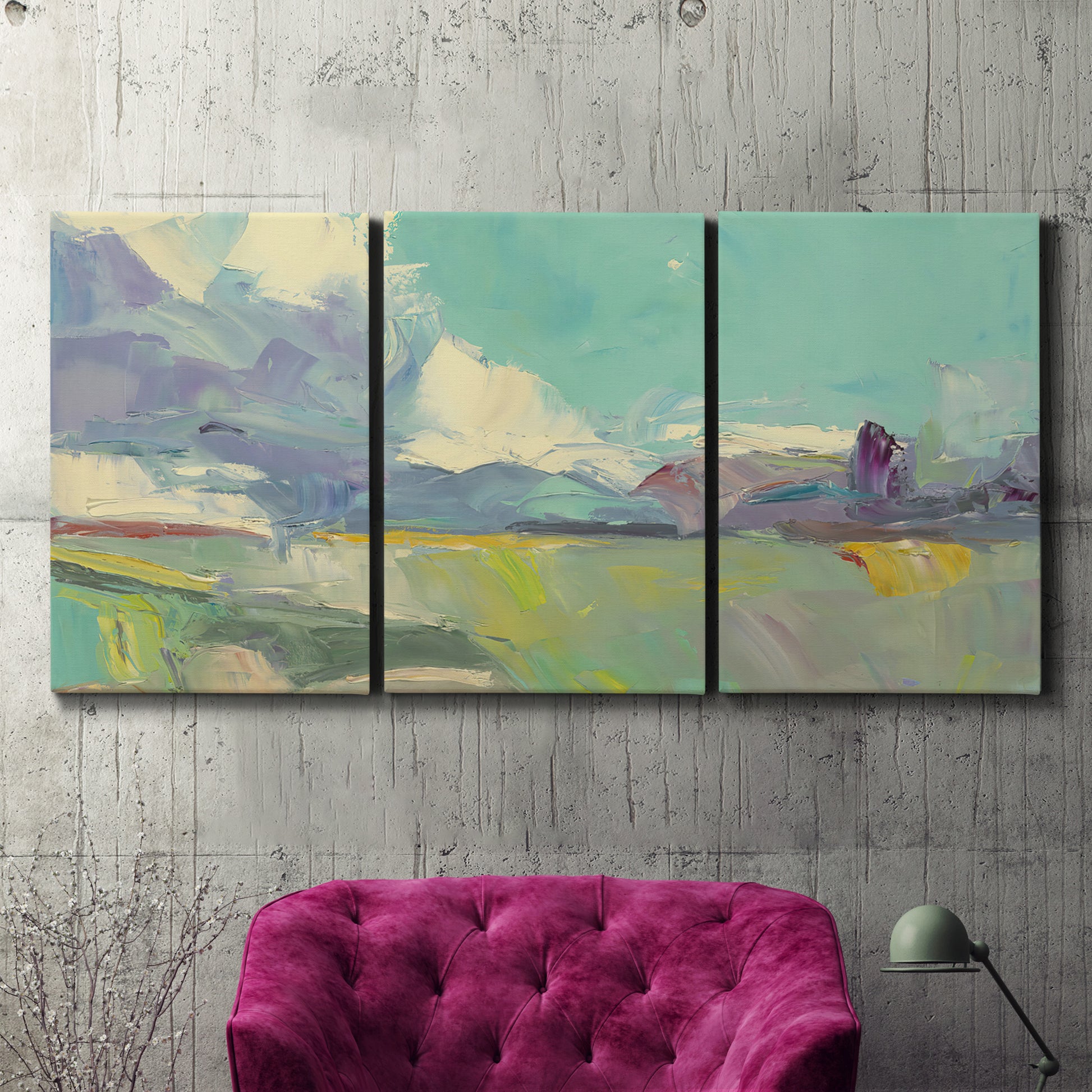 Three-panel canvas wall art featuring road stretching through open countryside, displayed in a living room above a suede accent chair.