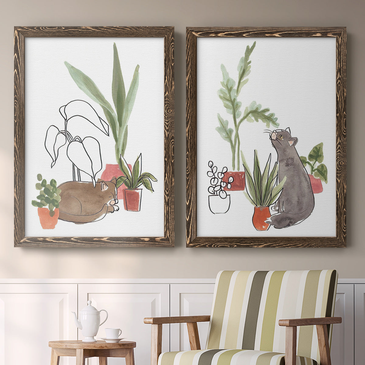 Set of two walnut barnwood framed canvas prints depicting two whimsical botanical animal illustrations featuring cats tucked among collections of potted houseplants above a sideboard in a cozy sitting room.