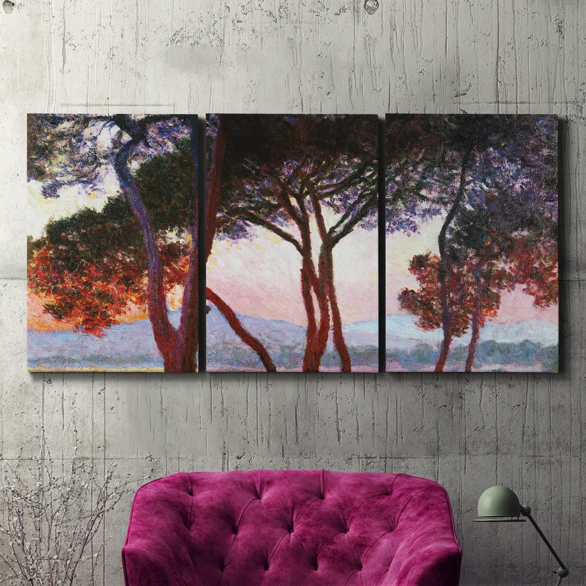 Three-panel canvas wall art featuring sunlit pines along mediterranean coast, displayed in a living room above a suede accent chair.