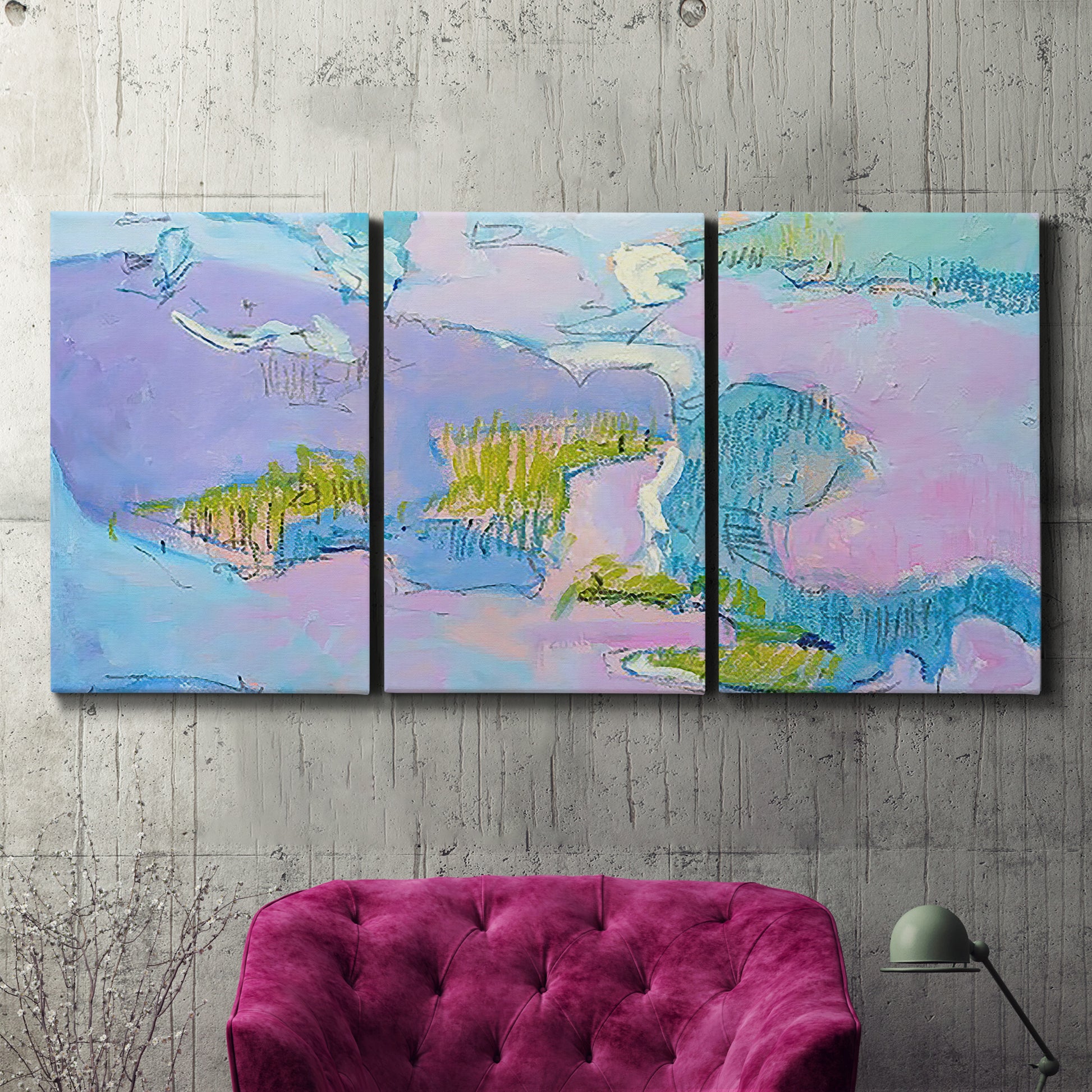 Three-panel canvas wall art featuring abstract view through window forms, displayed in a living room above a suede accent chair.