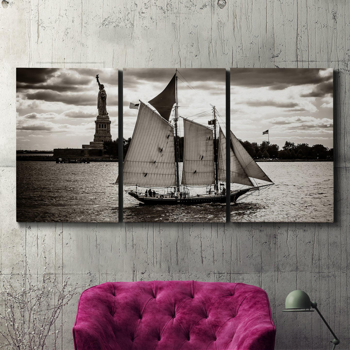 Three-panel canvas wall art featuring historic sailing ships photograph, displayed in a living room above a suede accent chair.