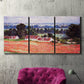 Three-panel canvas wall art featuring poppy field at giverny in bloom, displayed in a living room above a suede accent chair.