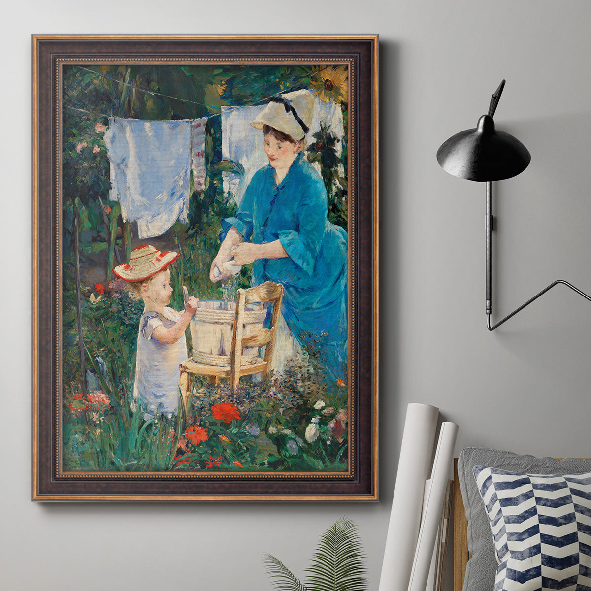 Intimate domestic genre scene by Édouard Manet in an ornate bronzed mahogany wood frame displayed in a neutral interior setting.