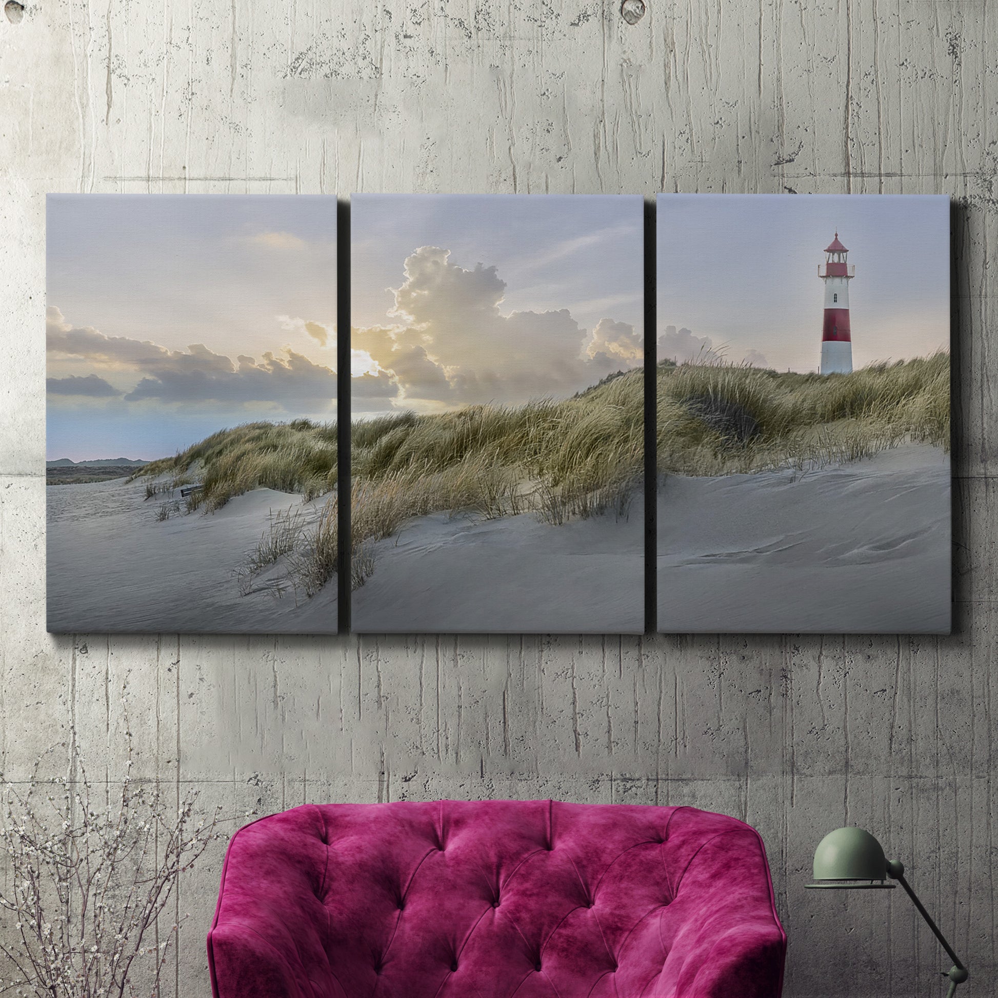 Three-panel canvas wall art featuring guardian boat along shoreline, displayed in a living room above a suede accent chair.