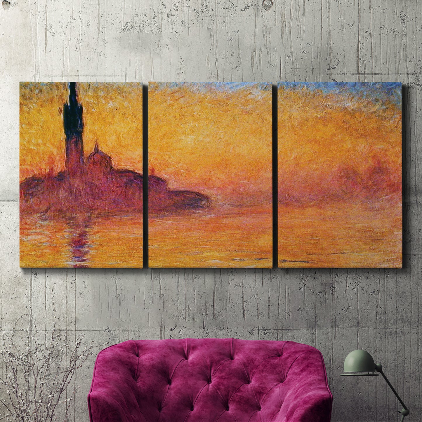 Three-panel canvas wall art featuring venetian church at twilight, displayed in a living room above a suede accent chair.