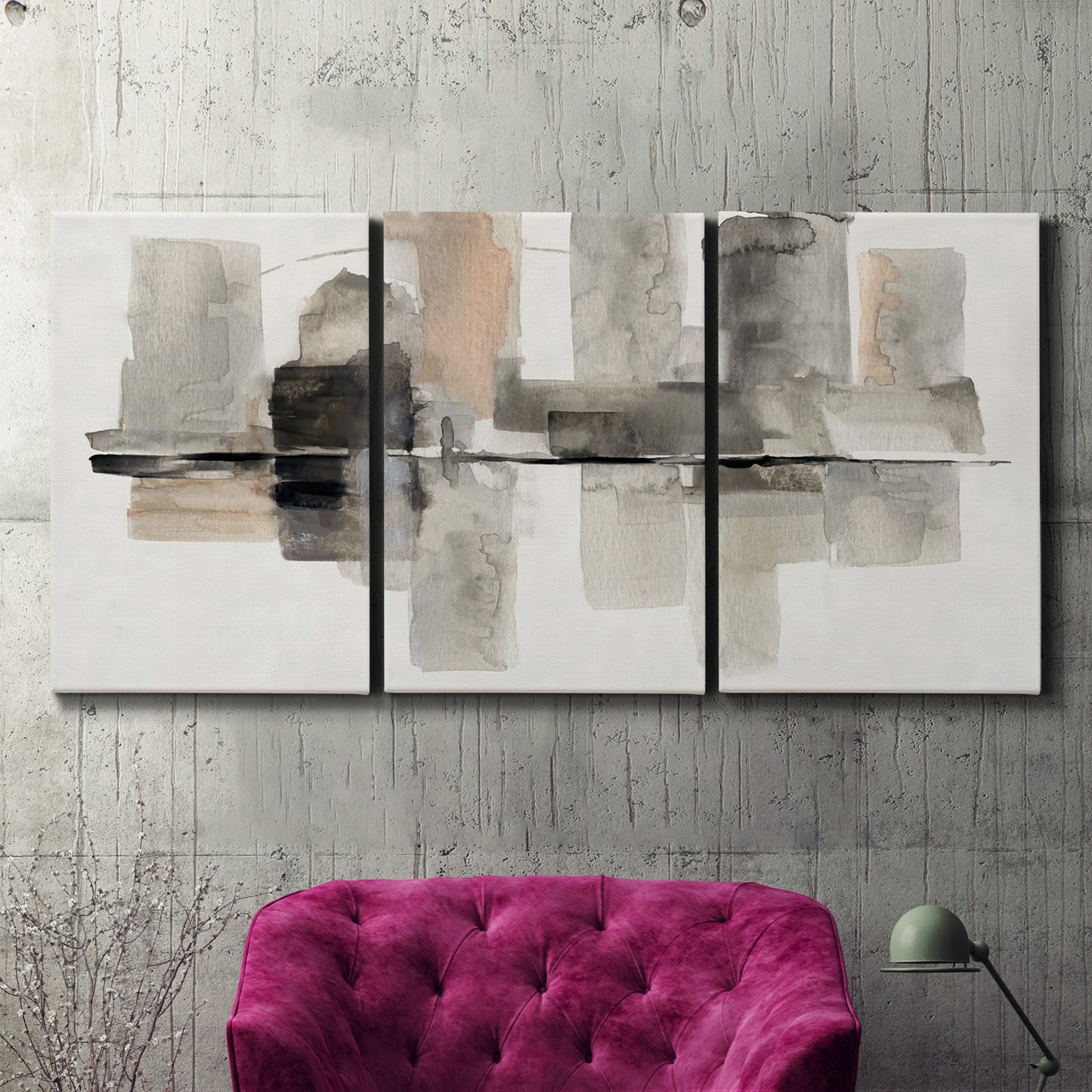 Three-panel canvas wall art featuring urban abstract watercolor oasis, displayed in a living room above a suede accent chair.