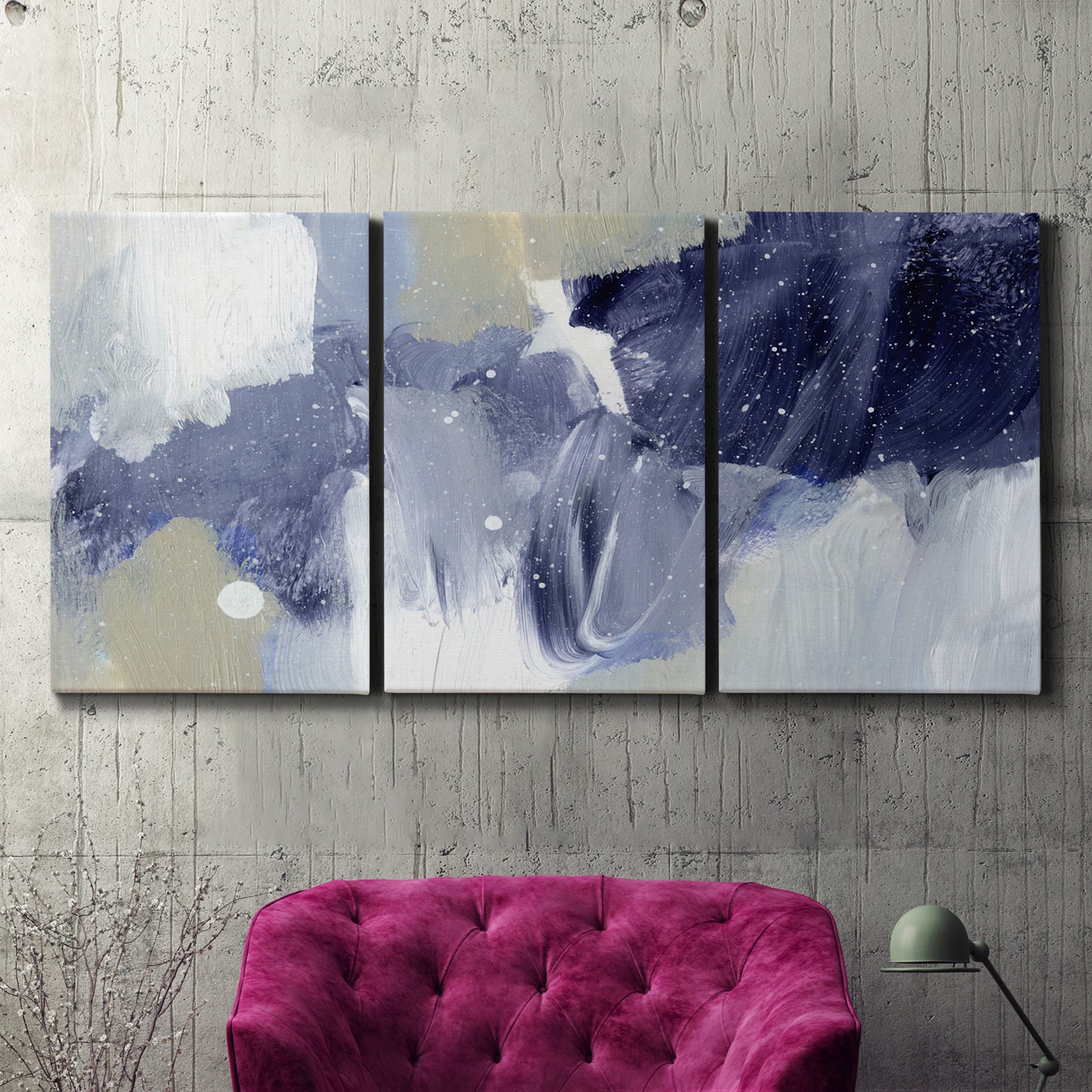 Three-panel canvas wall art featuring abstract sky break composition, displayed in a living room above a suede accent chair.
