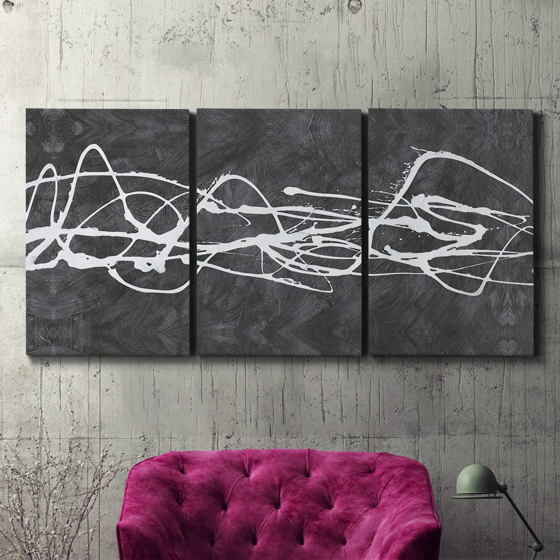 Three-panel canvas wall art featuring minimal abstract frequency lines, displayed in a living room above a suede accent chair.