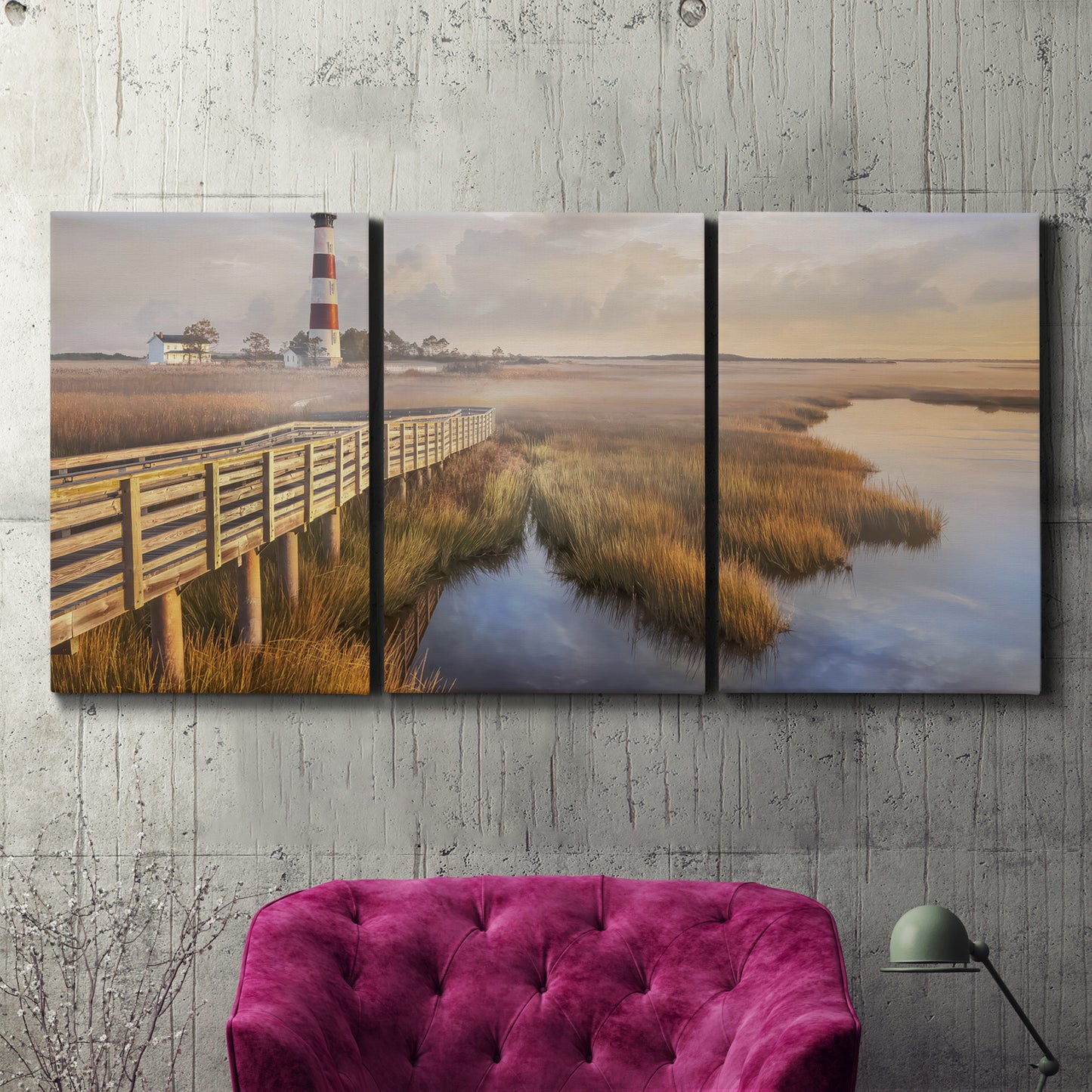 Three-panel canvas wall art featuring coastal path along dunes, displayed in a living room above a suede accent chair.