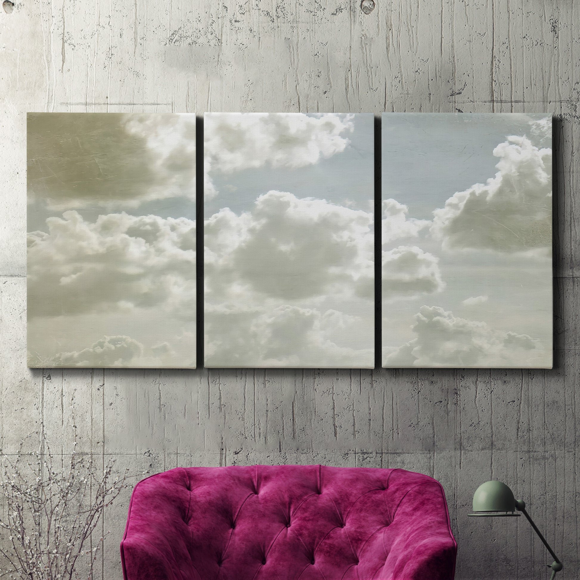 Three-panel canvas wall art featuring whimsical vertical tree landscape, displayed in a living room above a suede accent chair.