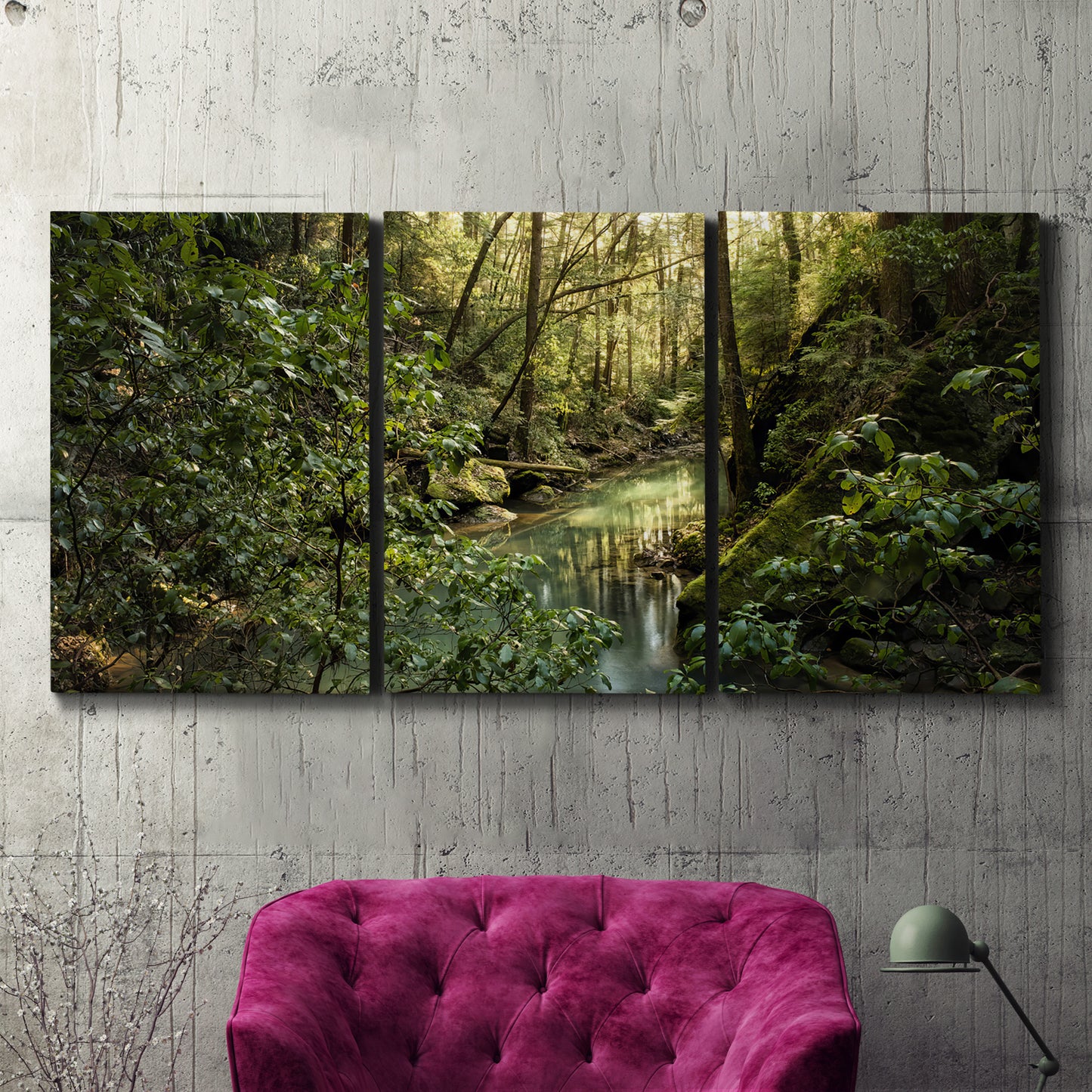 Three-panel canvas wall art featuring sun filtered woodland photograph, displayed in a living room above a suede accent chair.