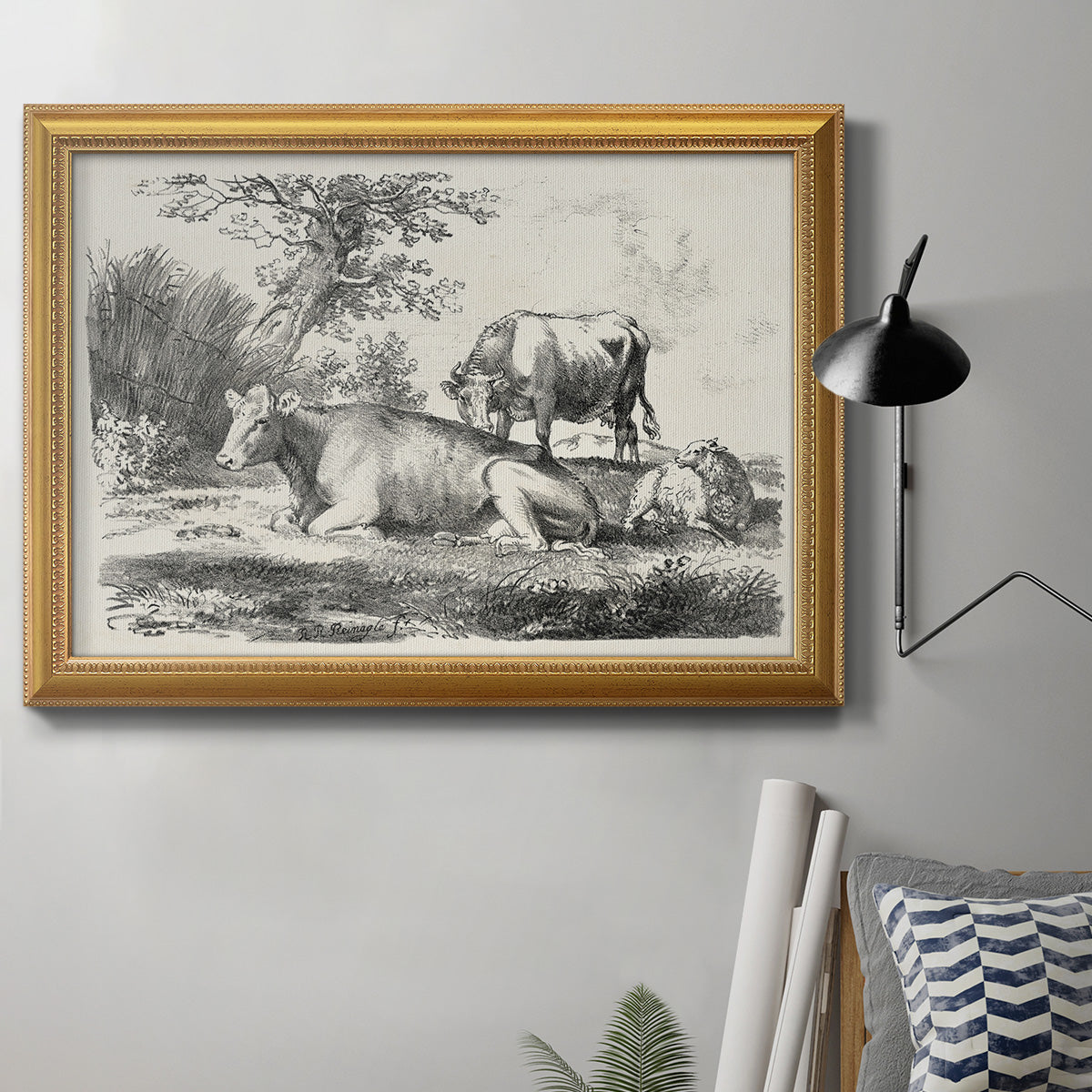 Classical pastoral landscape artwork by Nicolas Berchem in an ornate antique gold frame displayed in a neutral interior setting.