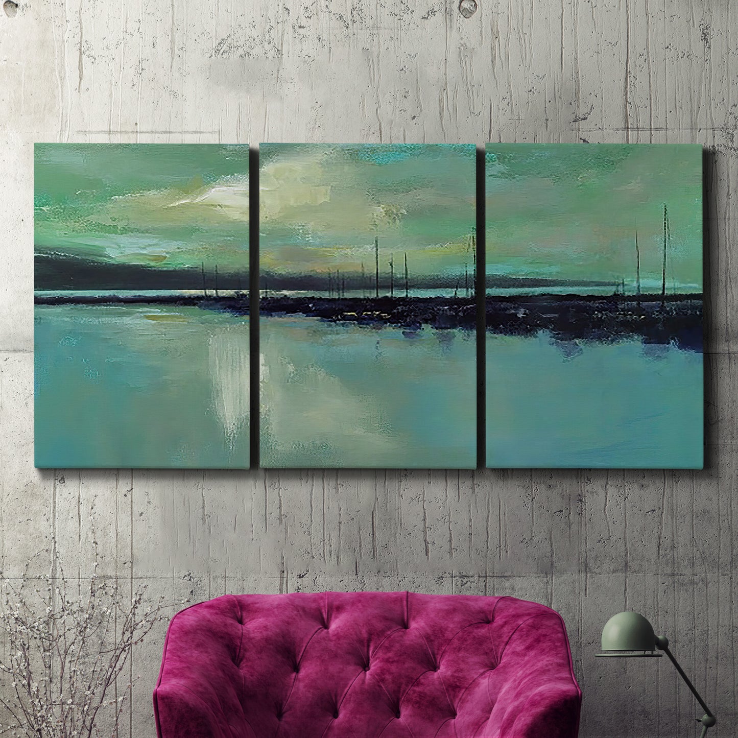 Three-panel canvas wall art featuring calm harbor water with glowing horizon, displayed in a living room above a suede accent chair.