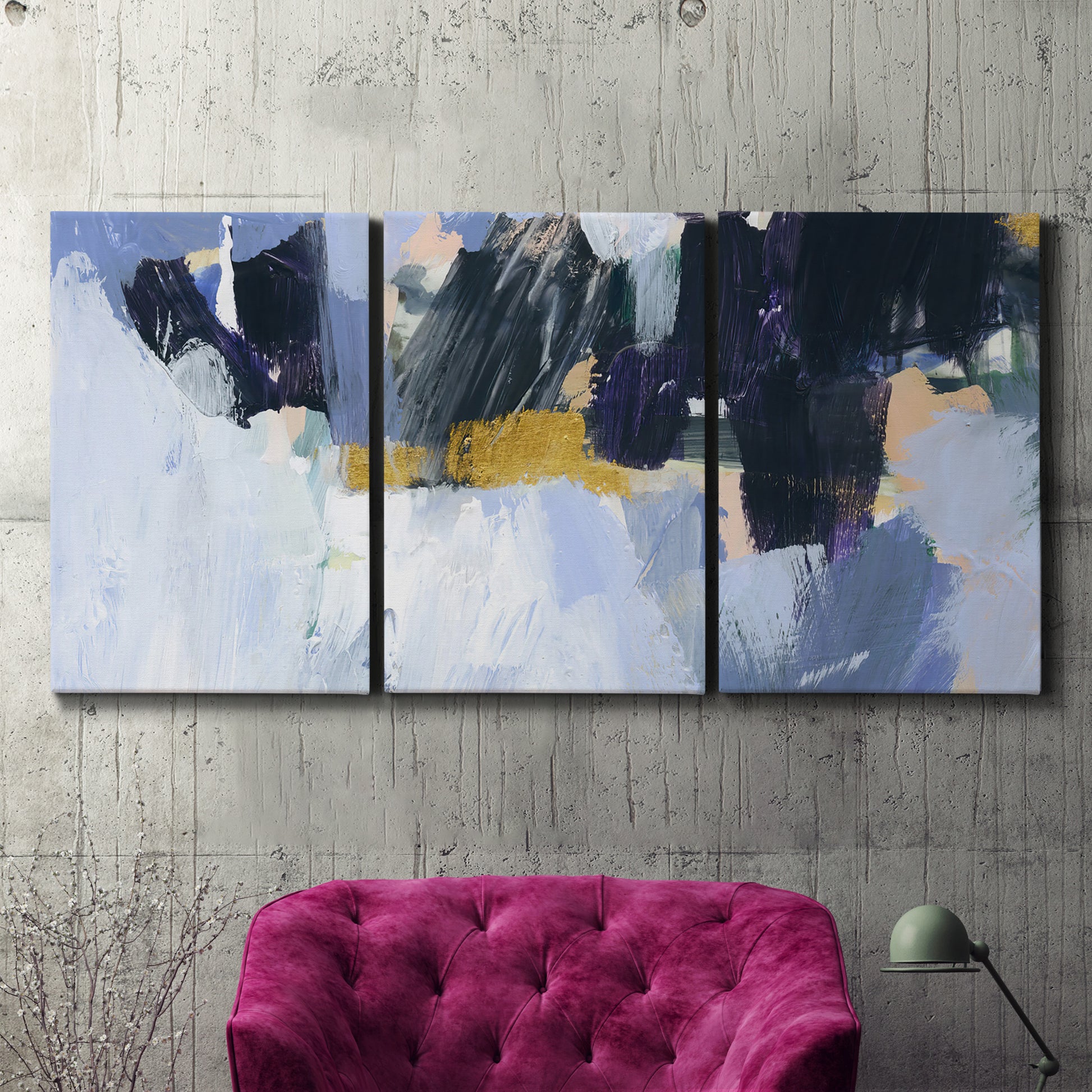 Three-panel canvas wall art featuring icy abstract arctic ledge, displayed in a living room above a suede accent chair.