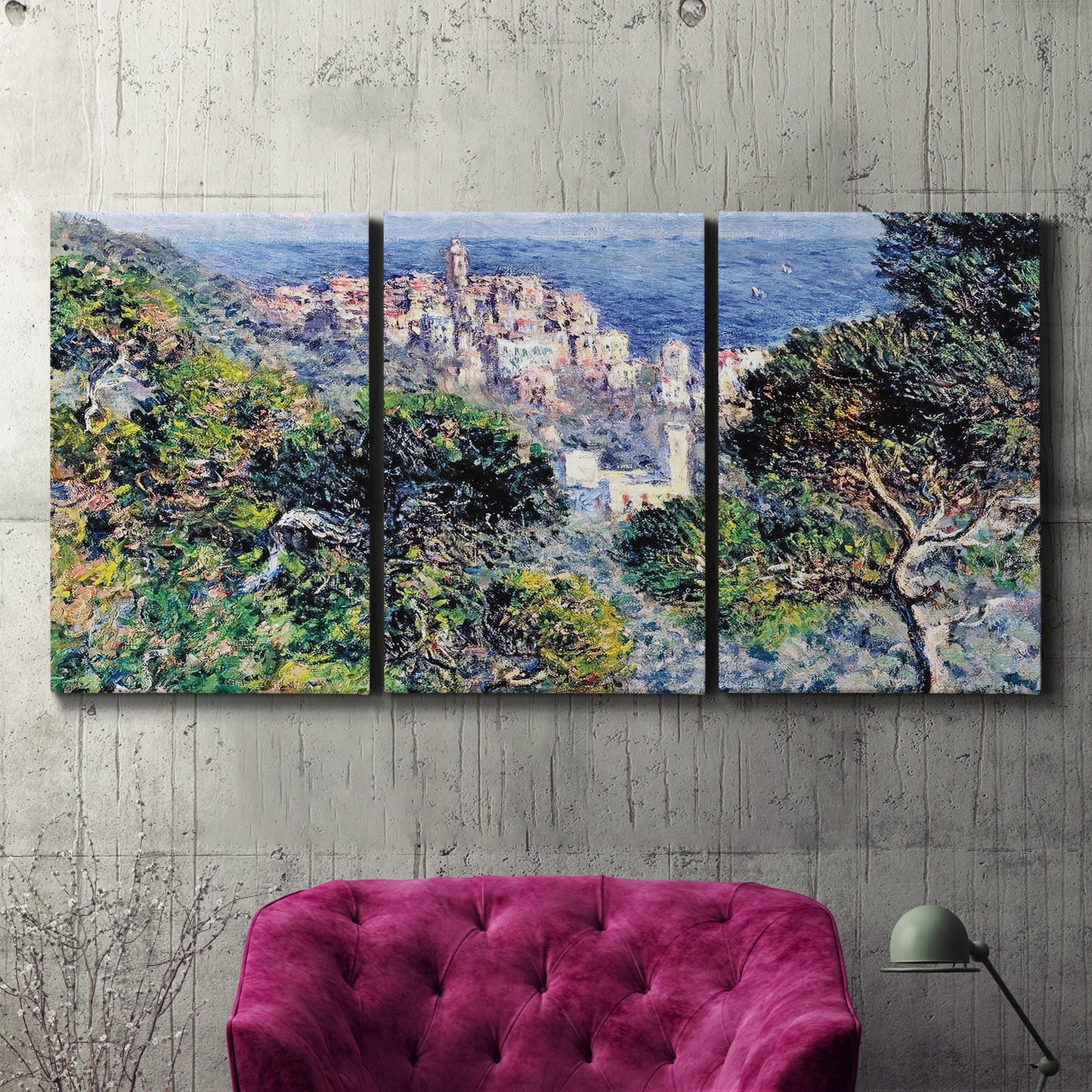 Three-panel canvas wall art featuring coastal hillside overlooking monaco, displayed in a living room above a suede accent chair.