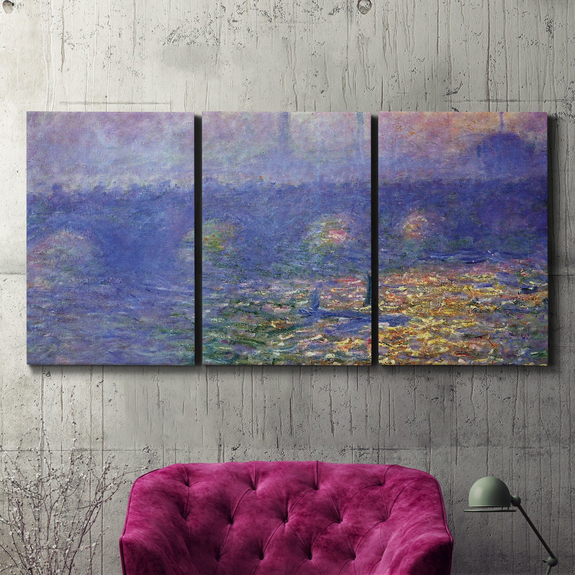 Three-panel canvas wall art featuring overcast bridge above river, displayed in a living room above a suede accent chair.