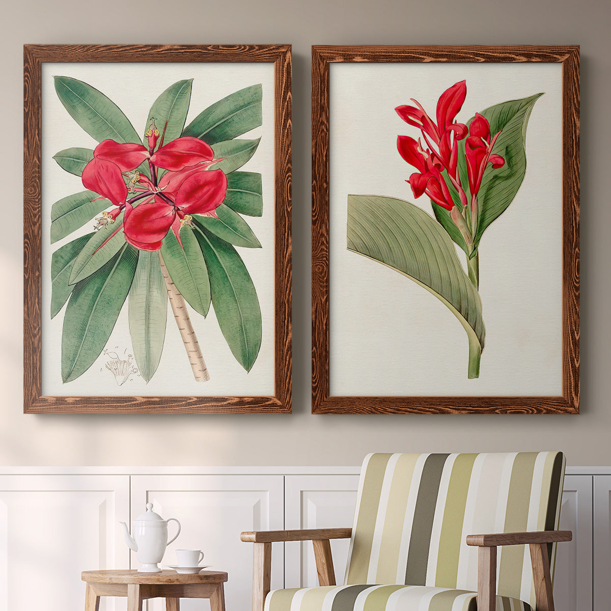 Set of two maple barnwood framed canvas prints depicting two antique botanical plate illustrations featuring vivid tropical flowering plants above a sideboard in a cozy sitting room.