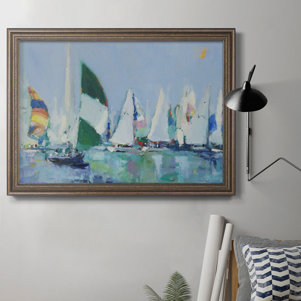 Coastal harbor watercolor painting in an ornate traditional bronze frame displayed in a neutral interior setting.